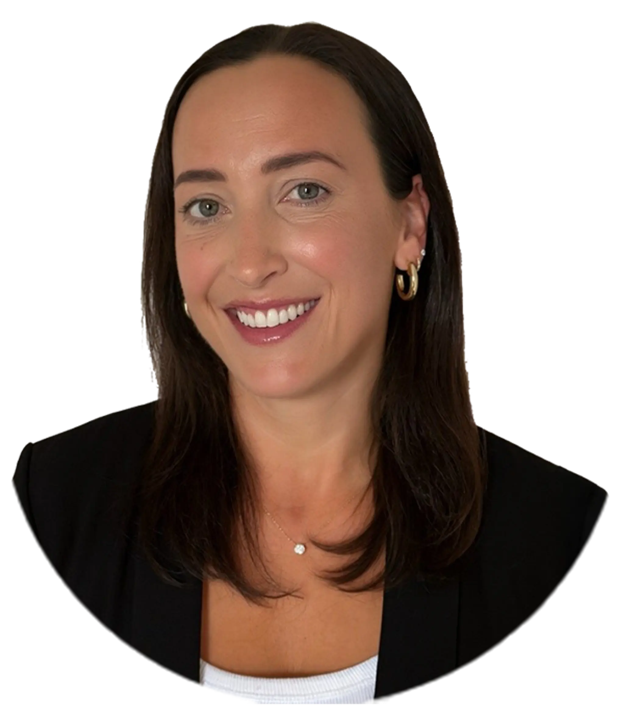 Person with shoulder-length dark hair, wearing gold hoop earrings, a black blazer, and a white top, smiling.