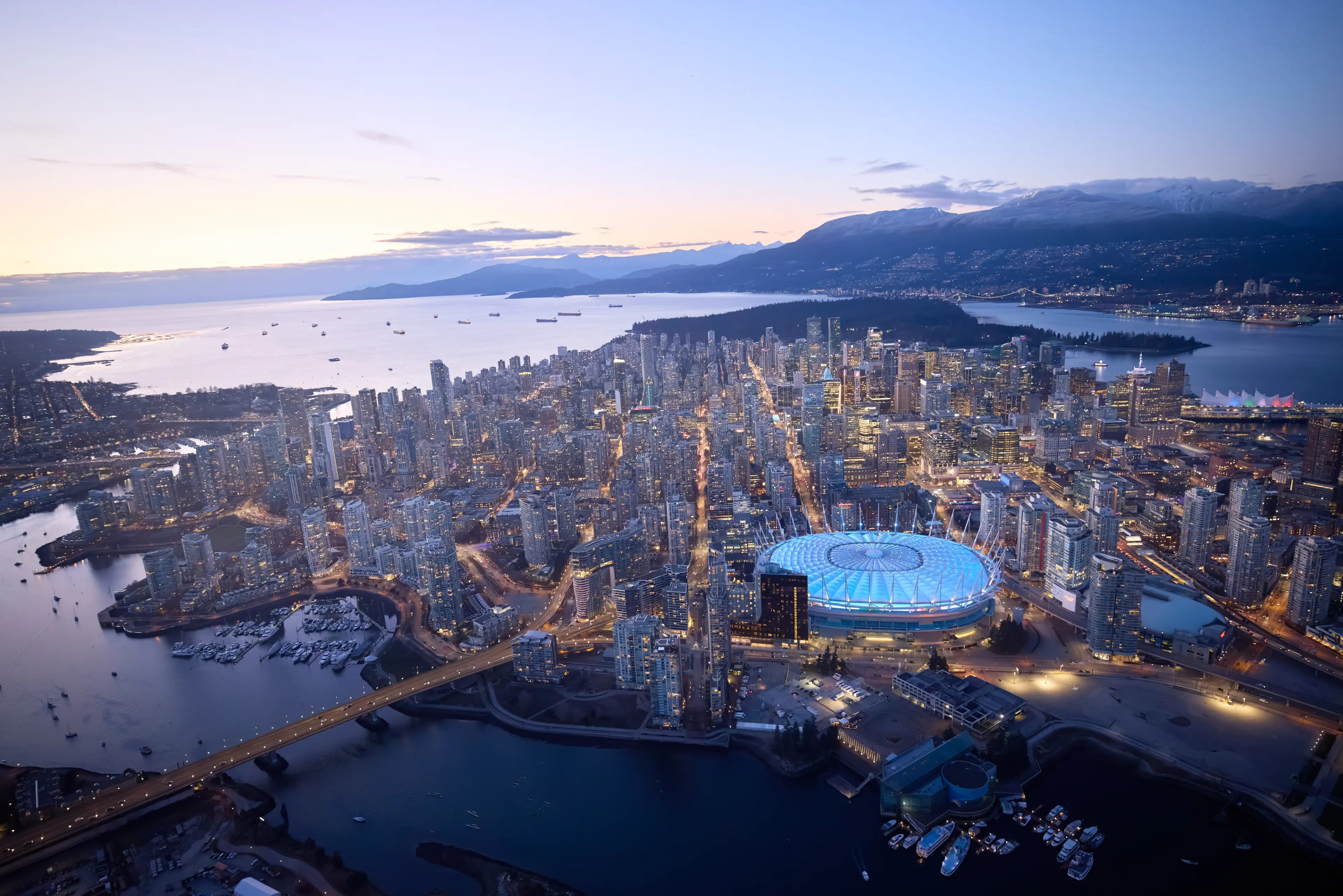 BC Place lit up at dusk in Vancouver.