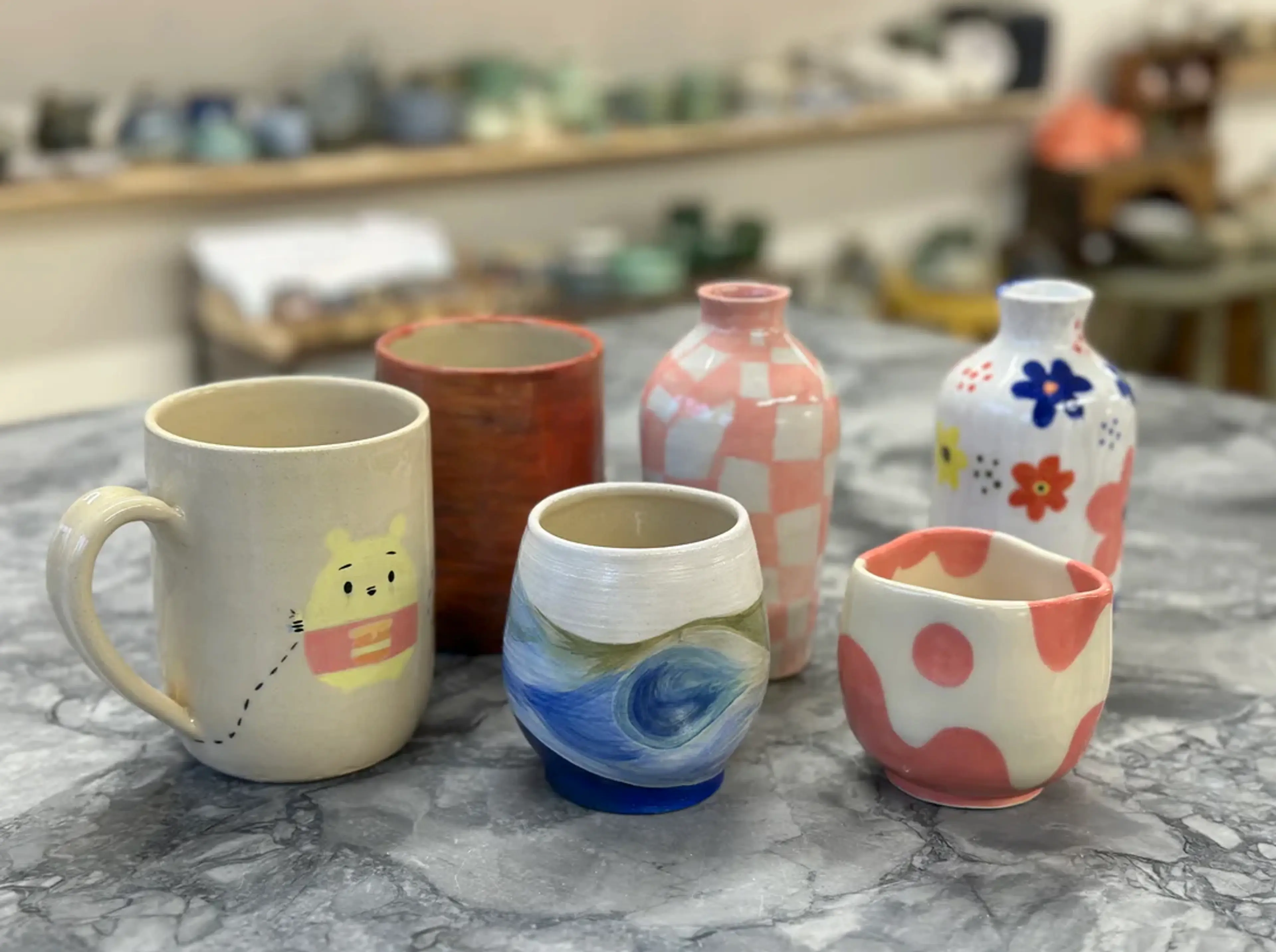 Hand-painted pottery at Cafe au Clay in Vancouver.