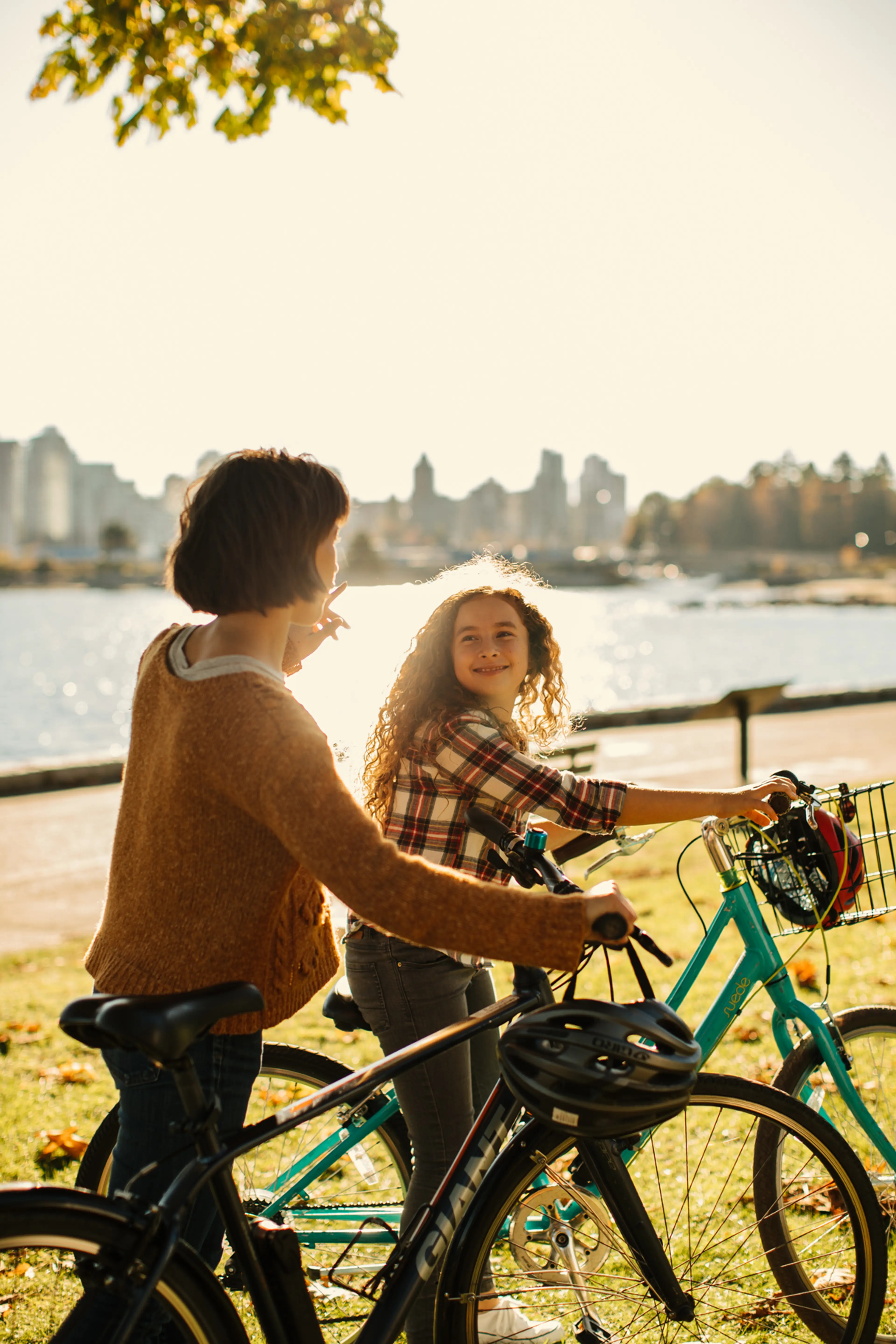 Family cycling on the Stanley Park Seawall in Vancouver