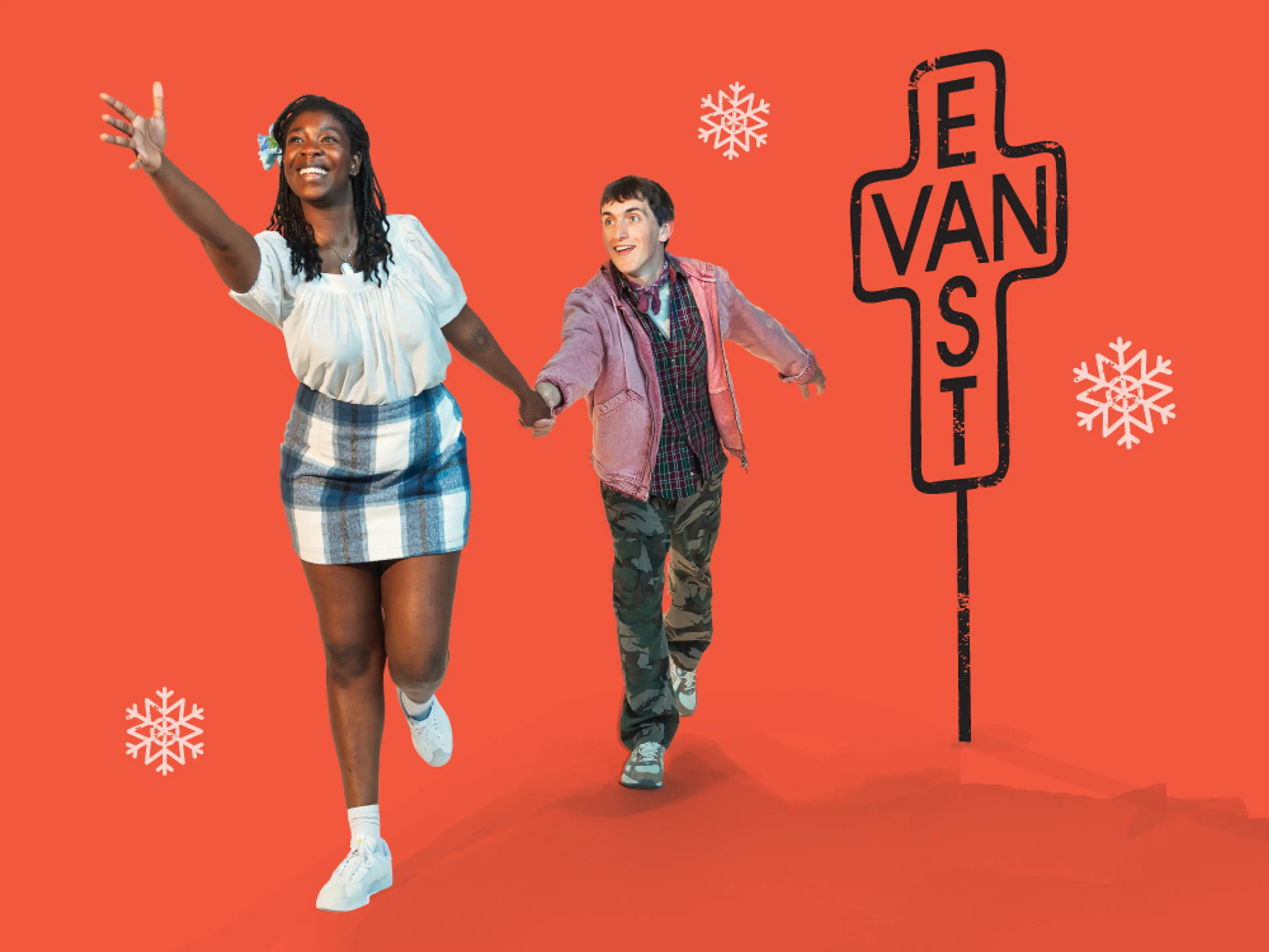 Two people holding hands, with one leading the other forward. The East Van cross sign is visible in the background.