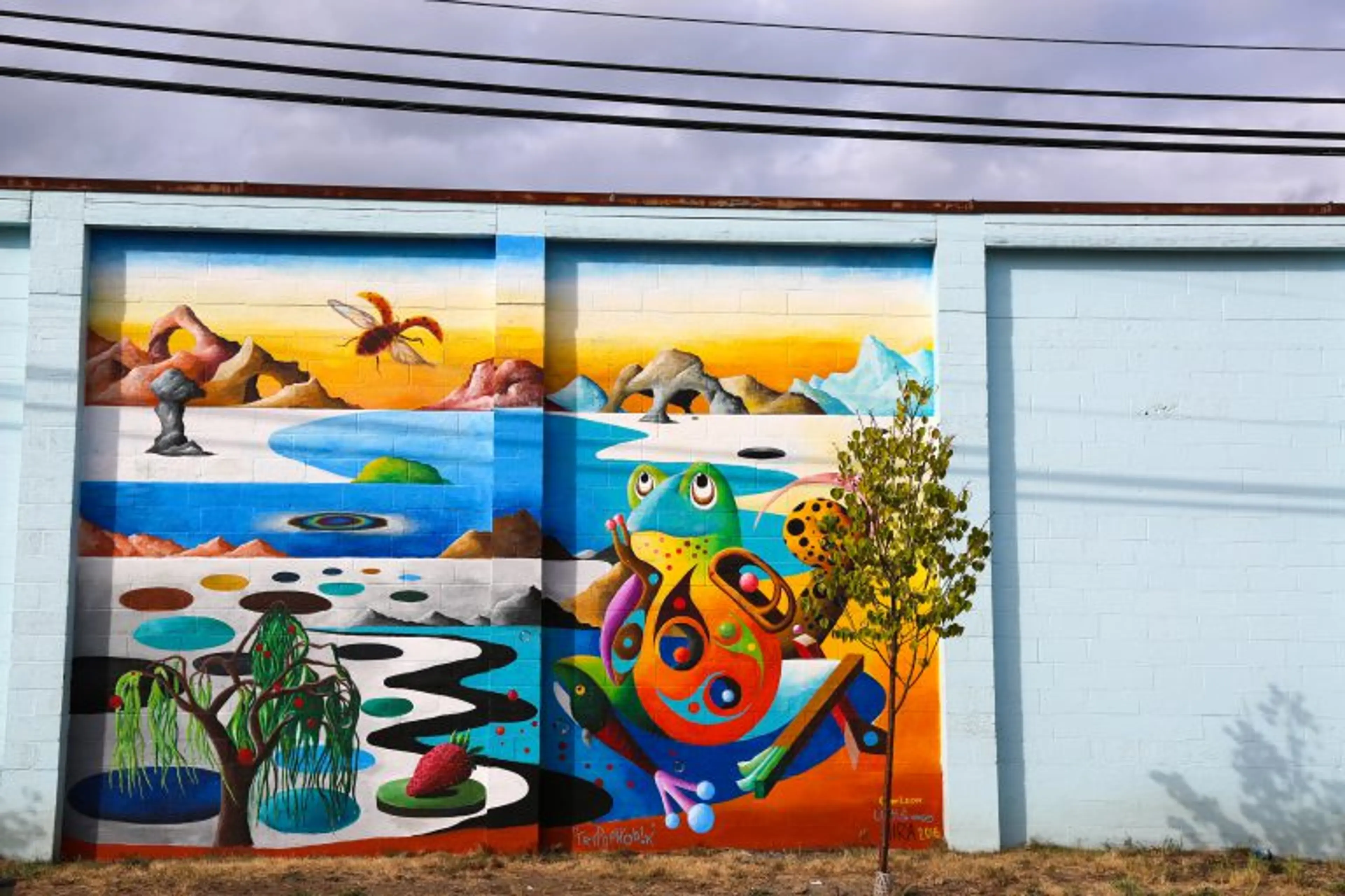 Mural by Cody Lecoy, @codylecoy, Lenslie Vargas, and Hira. 