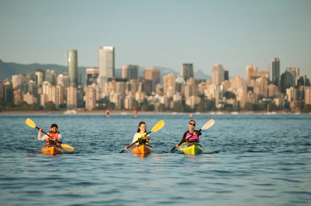 Kayaking with the Vancouver Skyline in the back