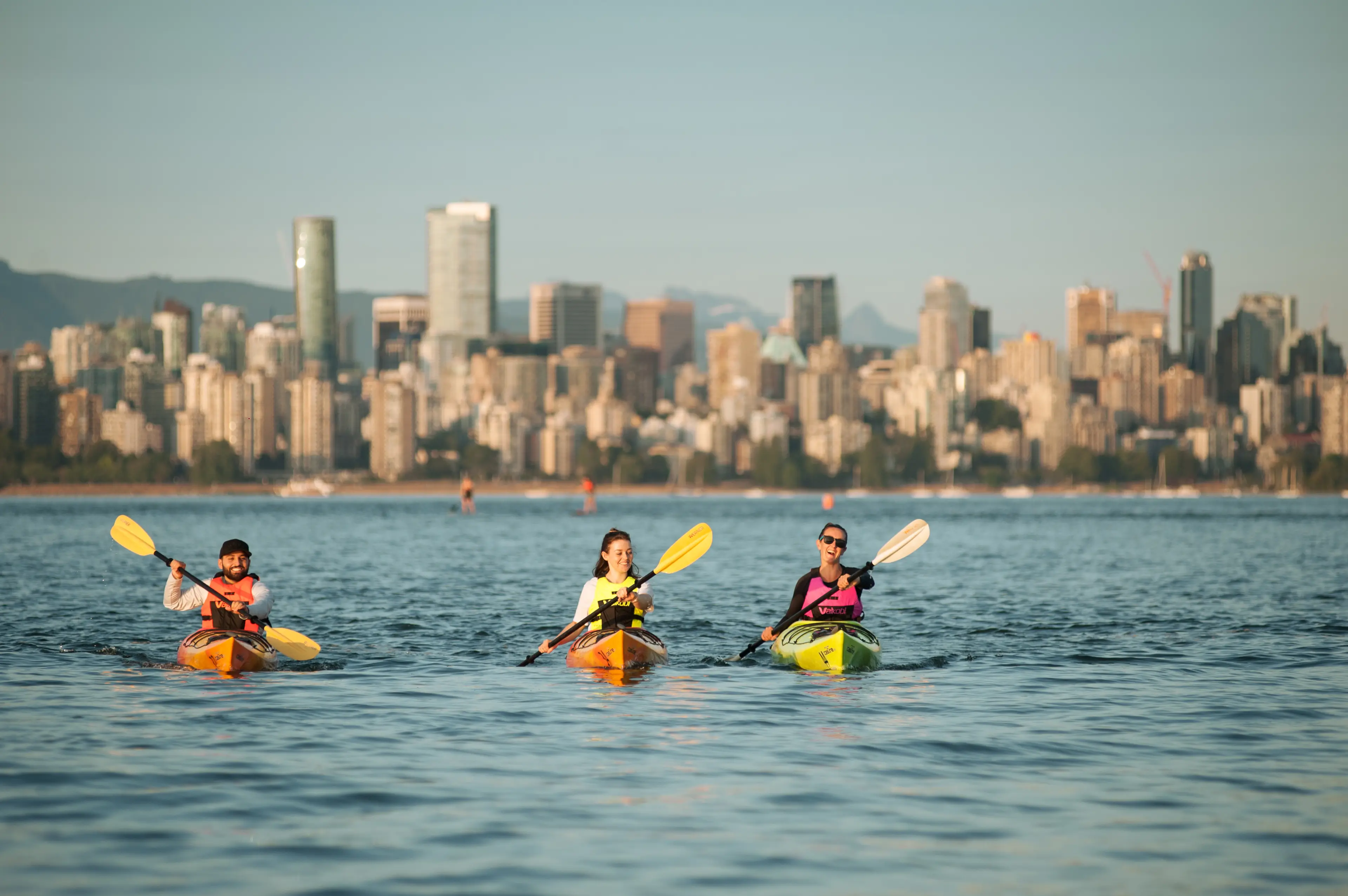 Kayaking with the Vancouver Skyline in the back