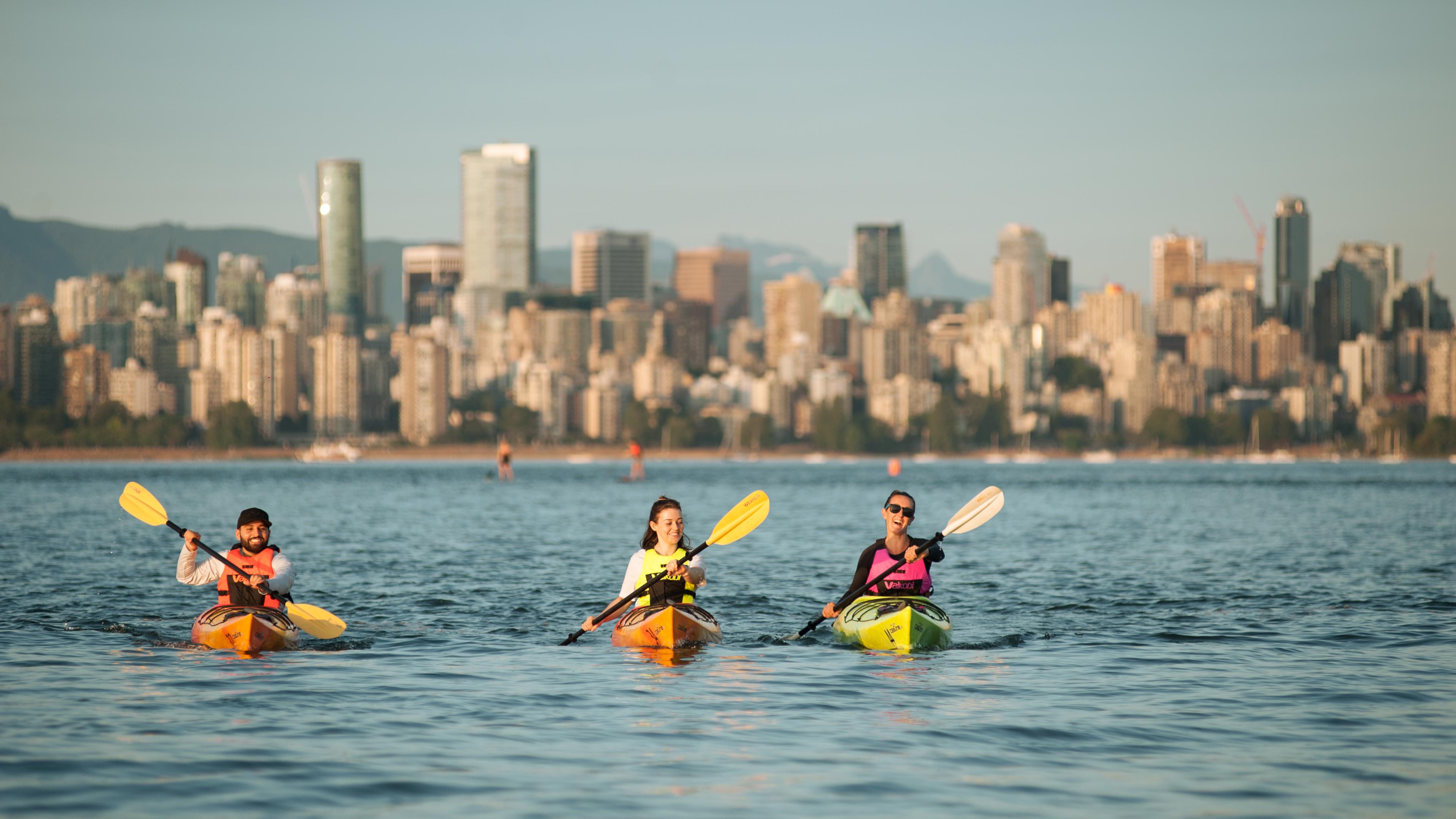 Kayaking with the Vancouver Skyline in the back