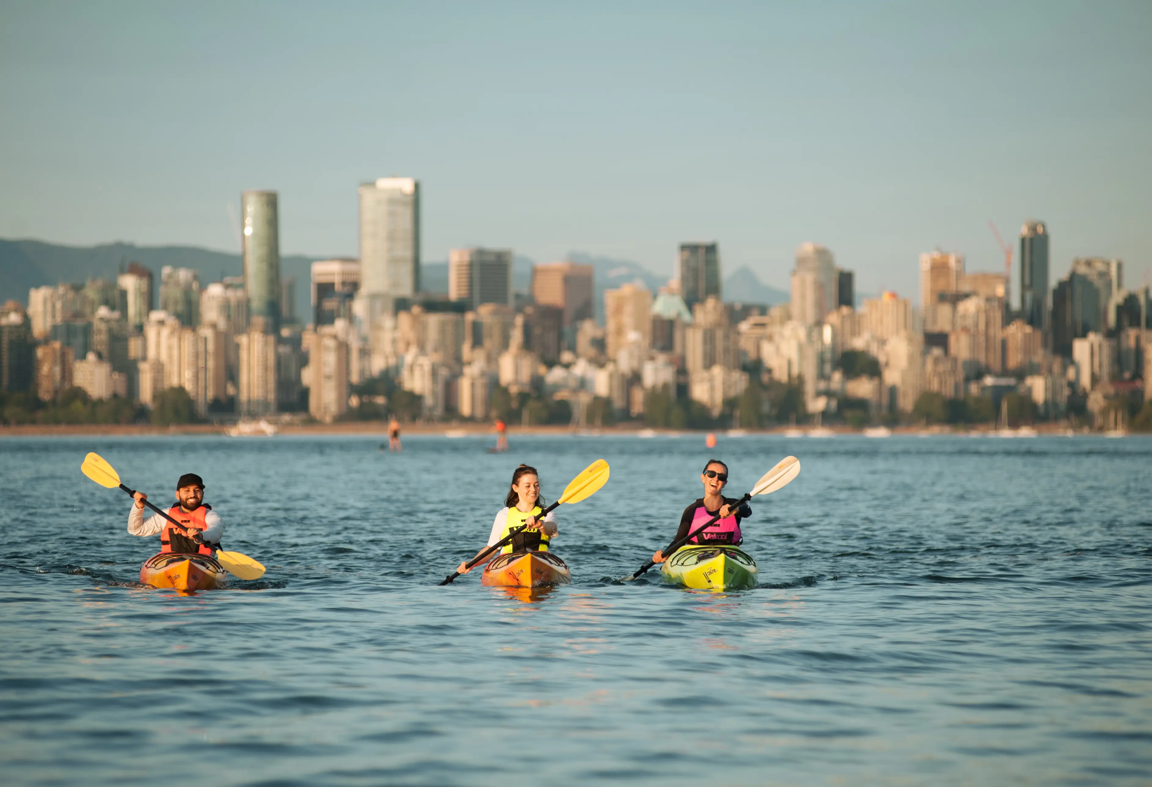 Kayaking with the Vancouver Skyline in the back