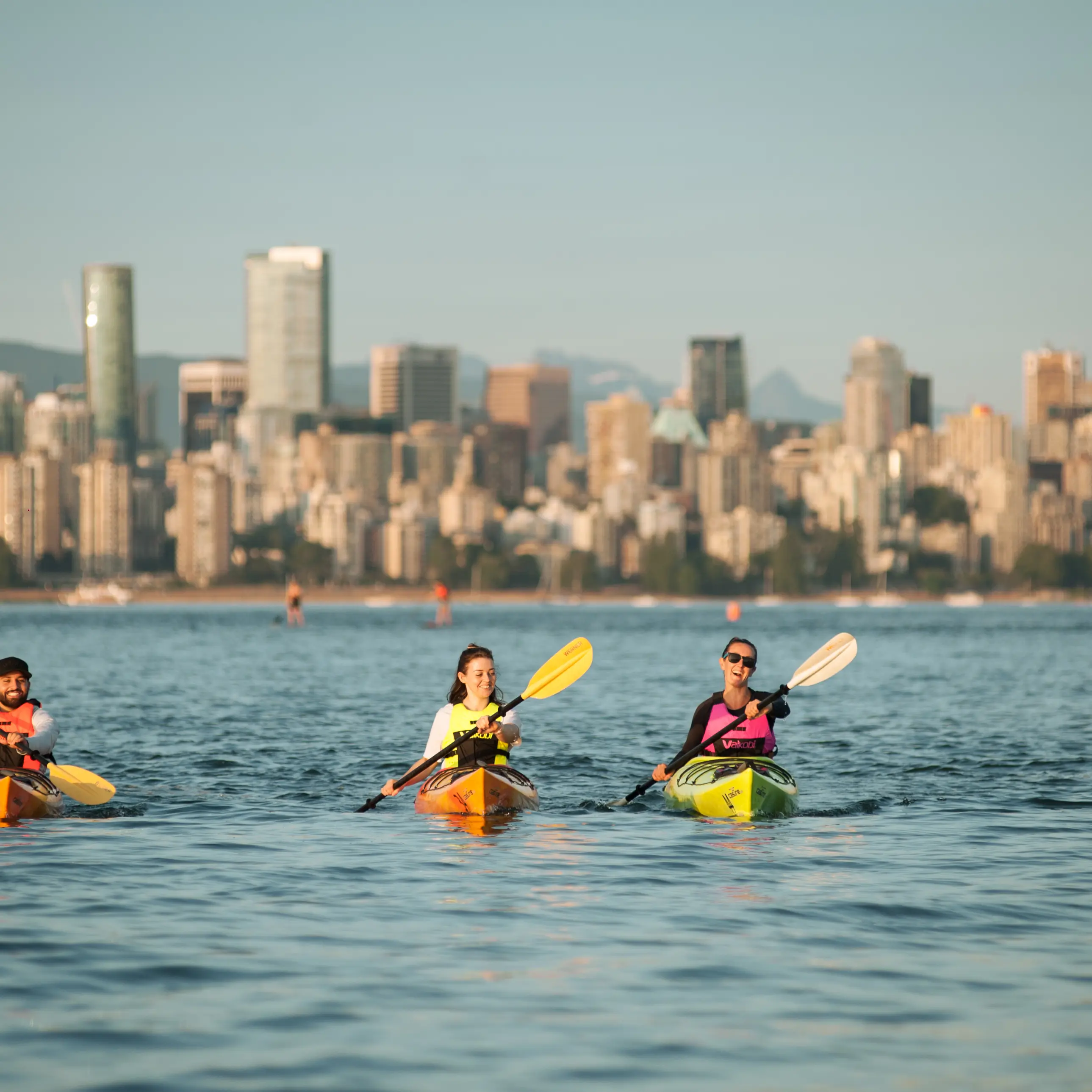 Kayaking with the Vancouver Skyline in the back
