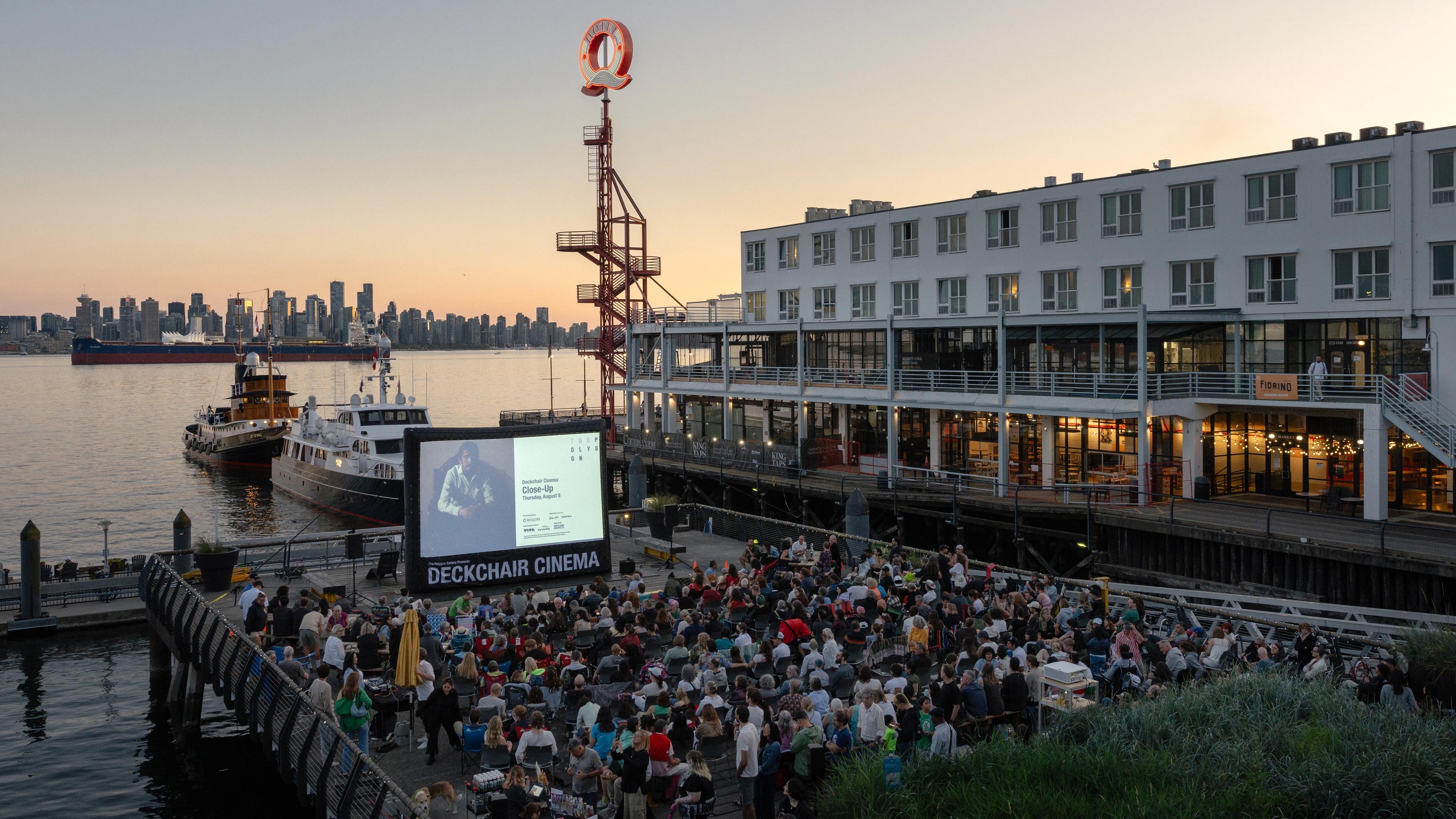 People watch an outdoor movie at Deckchair Cinema at the Polyon Gallery in North Vancouver.