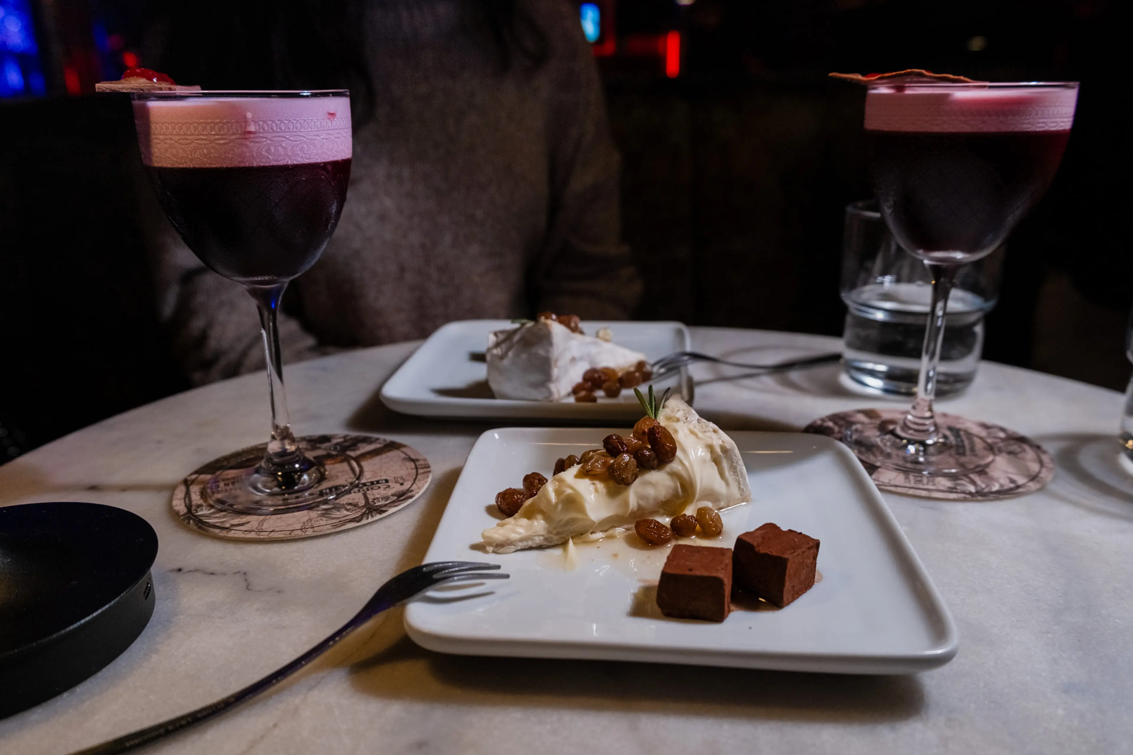 Two cocktails and a desert at Copperpenny Distilling in Vancouver.