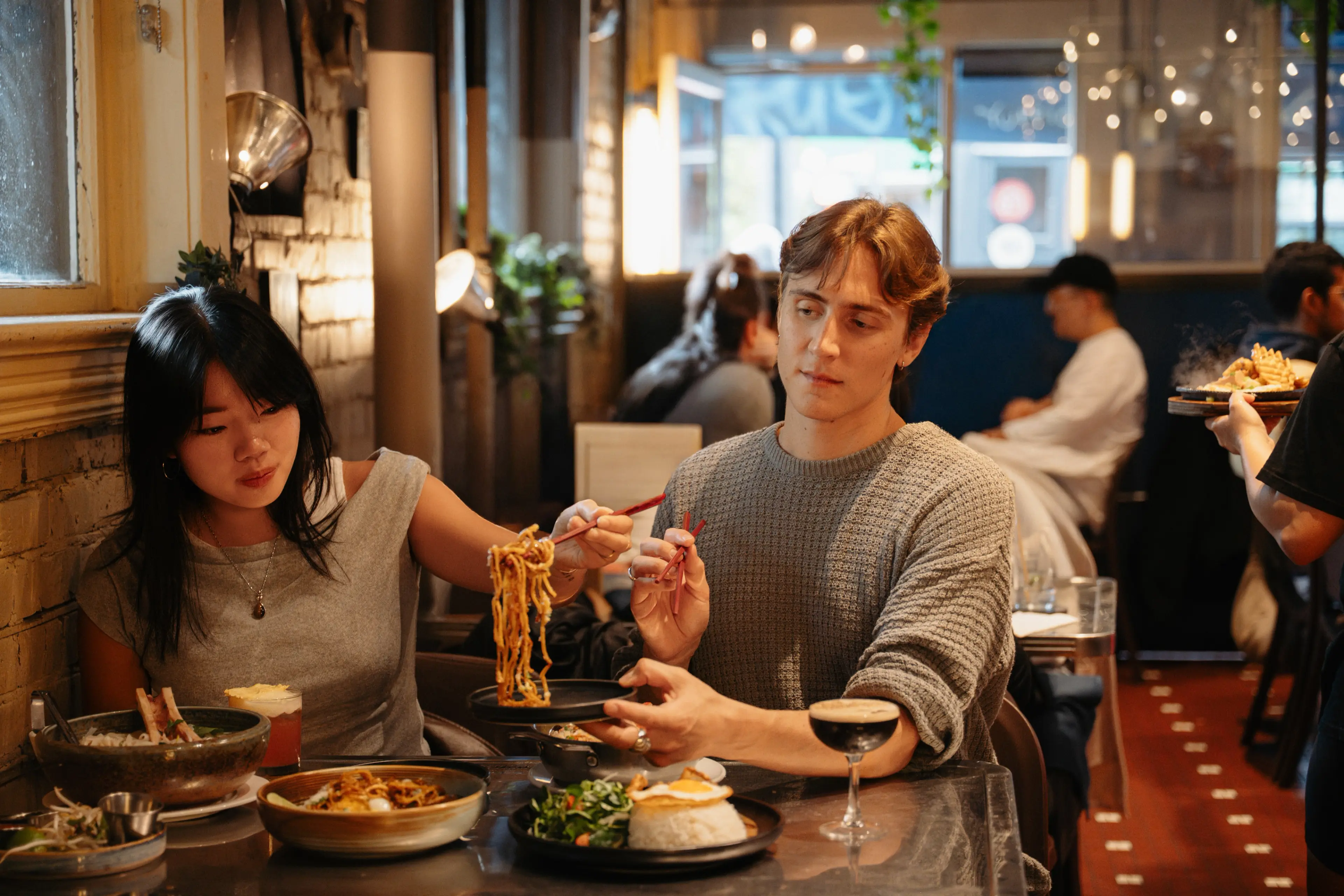 Two people dining at the Lunch Lady in Vancouver.