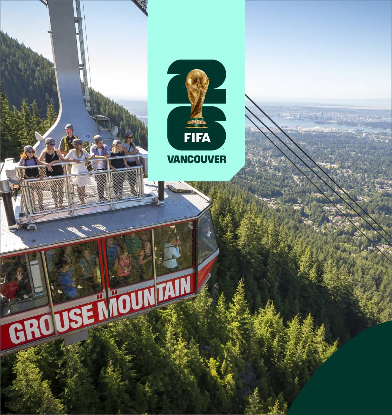 People wearing helmets on top and inside a Grouse Mountain cable car with a forest and city view in the background.