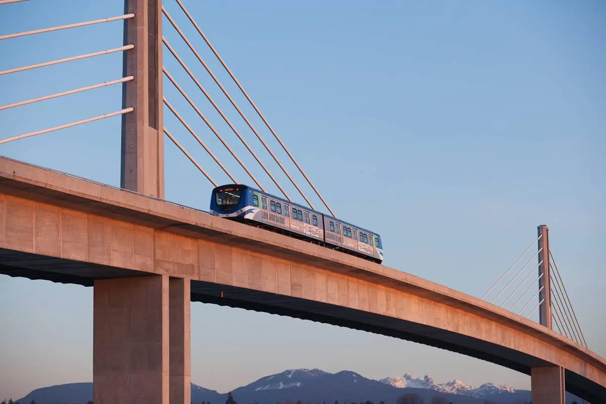 Skytrain crossing the Skybridge over the Fraser River.
