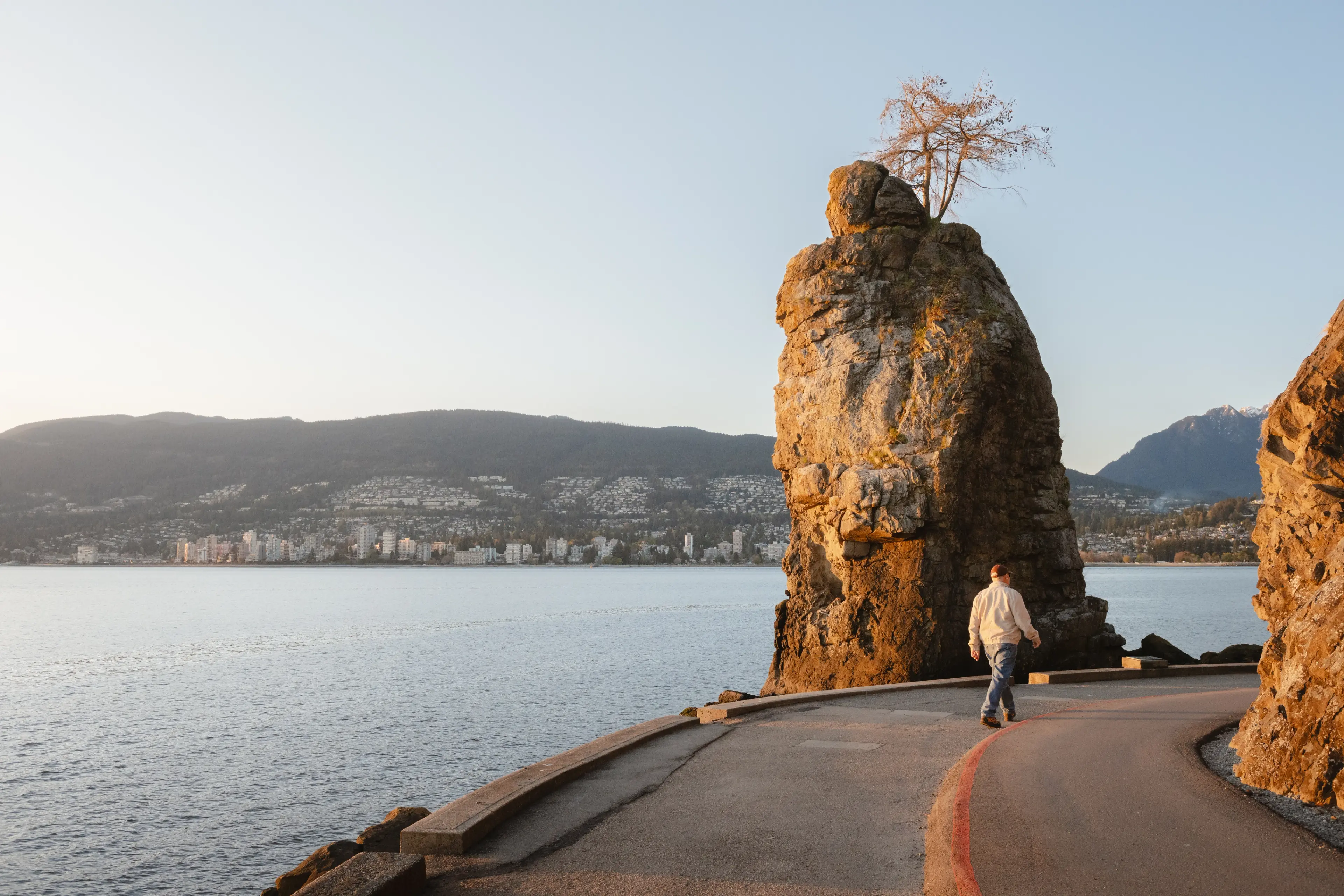 Walking near Siwash Rock on the Stanley Park Seawall