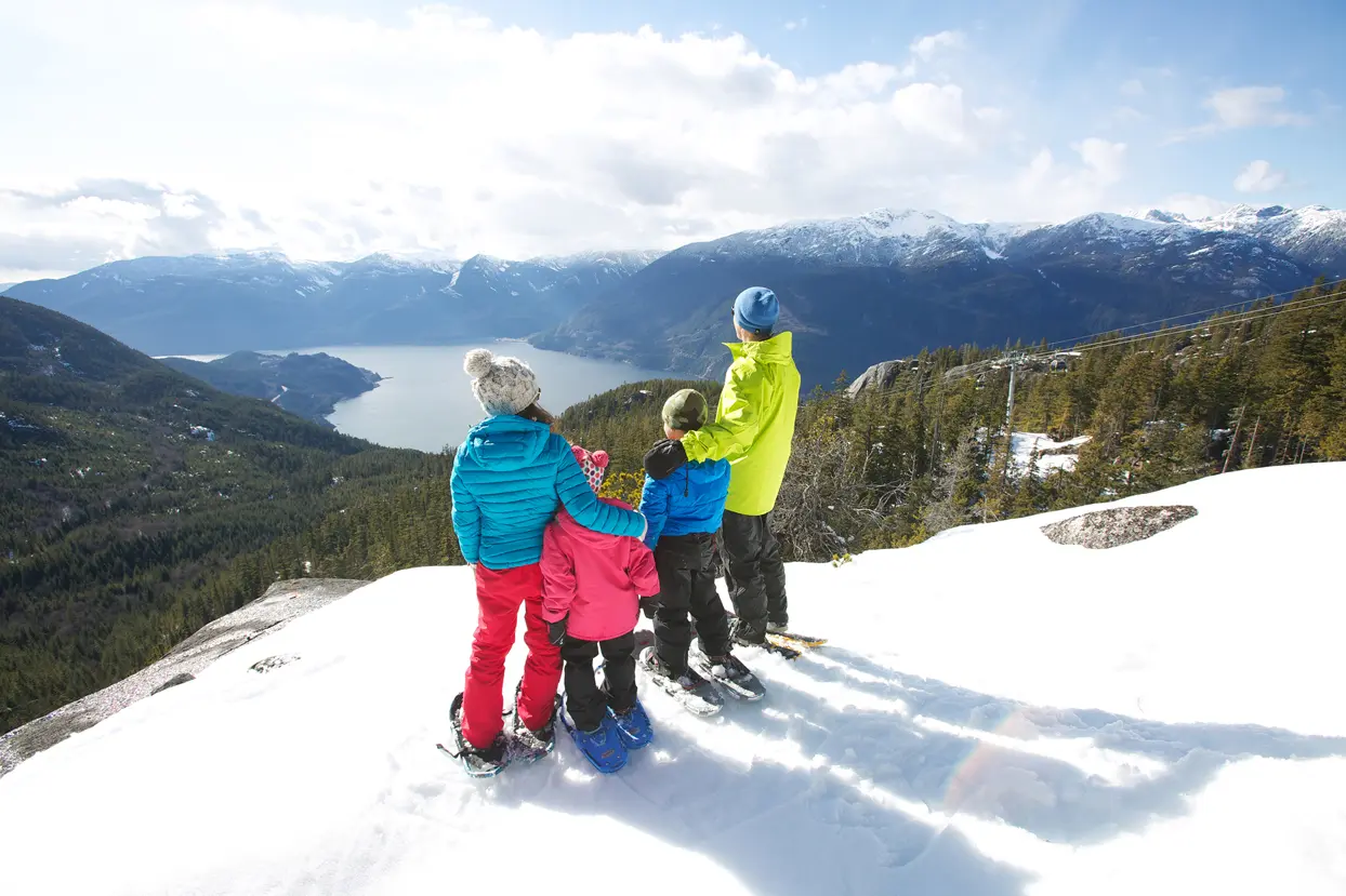 Family snowshoeing at the Sea to Sky Gondola in Squamish