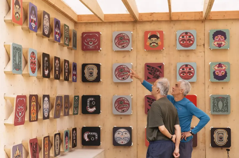 Two men inside an art gallery