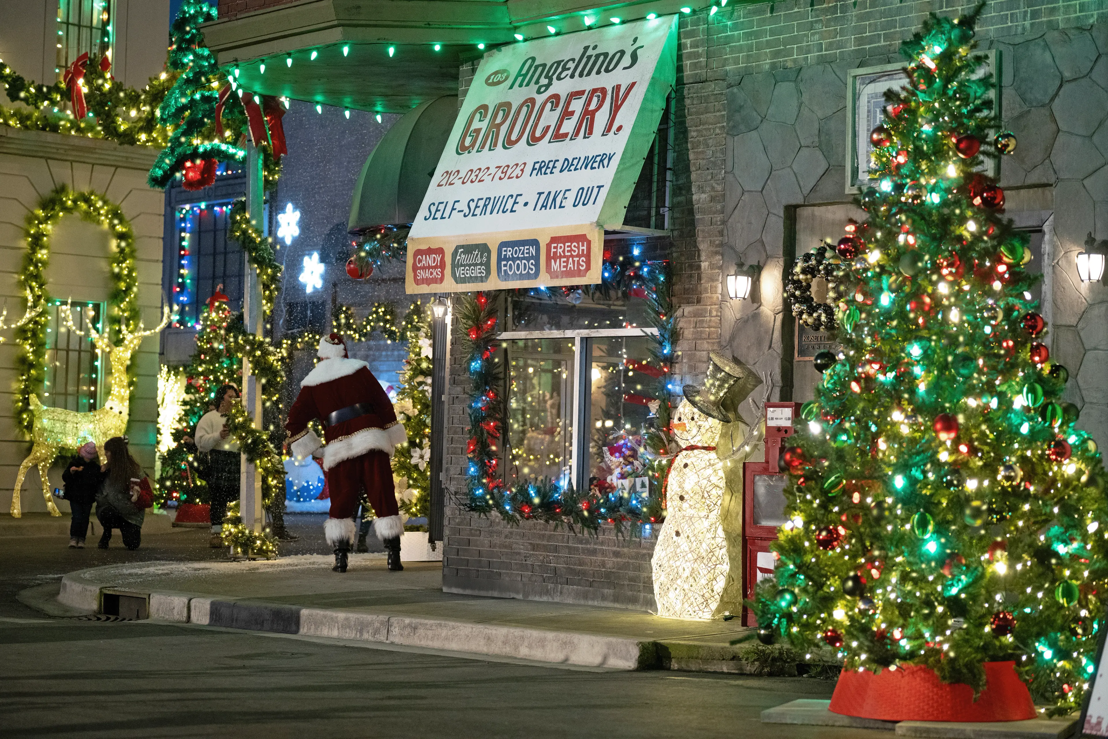 Houses decorated with Christmas lights and decor at Martini Town near Vancouver.