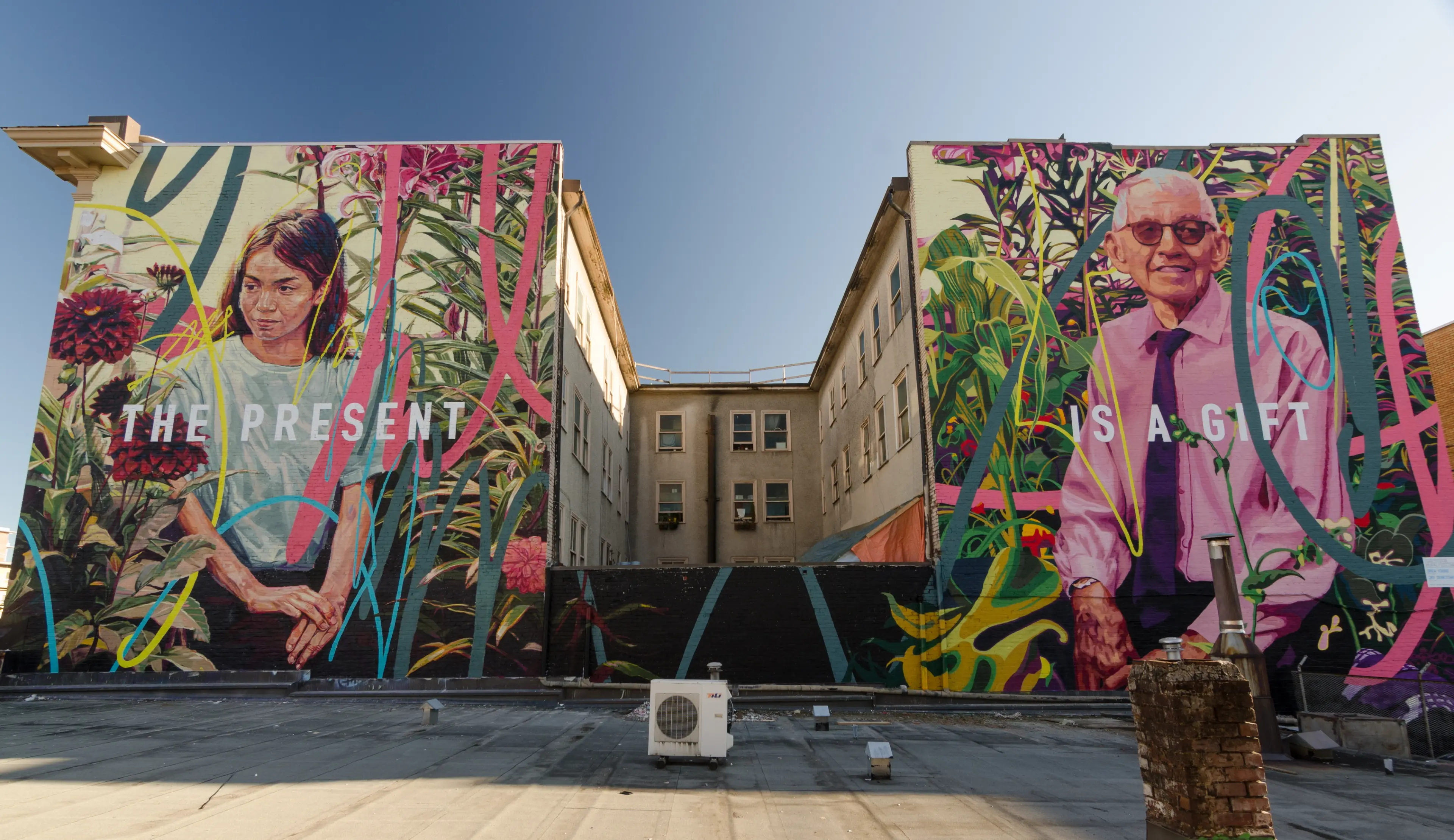 Mural of two long-time Mount Pleasant residents in The Present Is a Gift