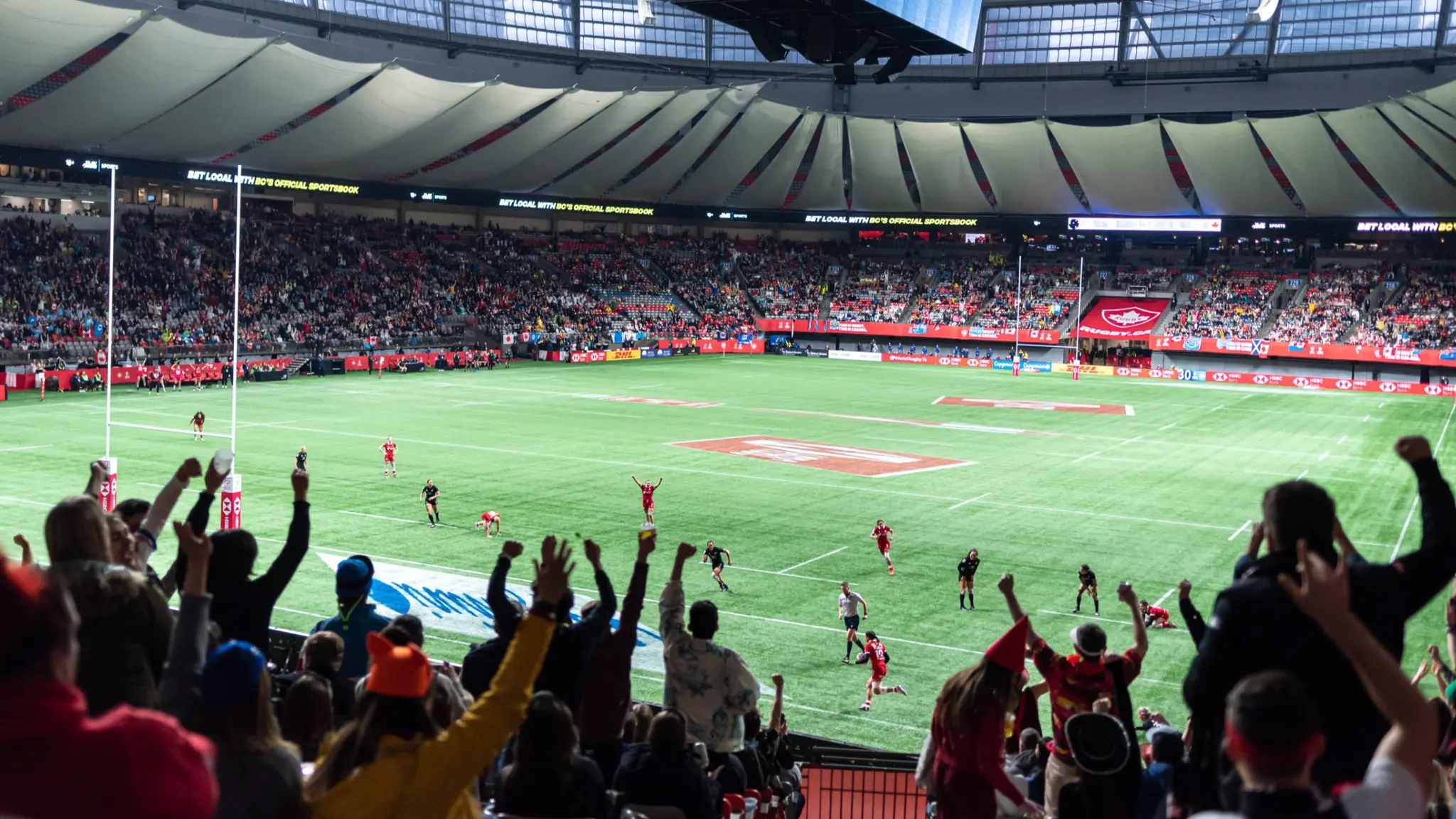 Fans watching a rugby game
