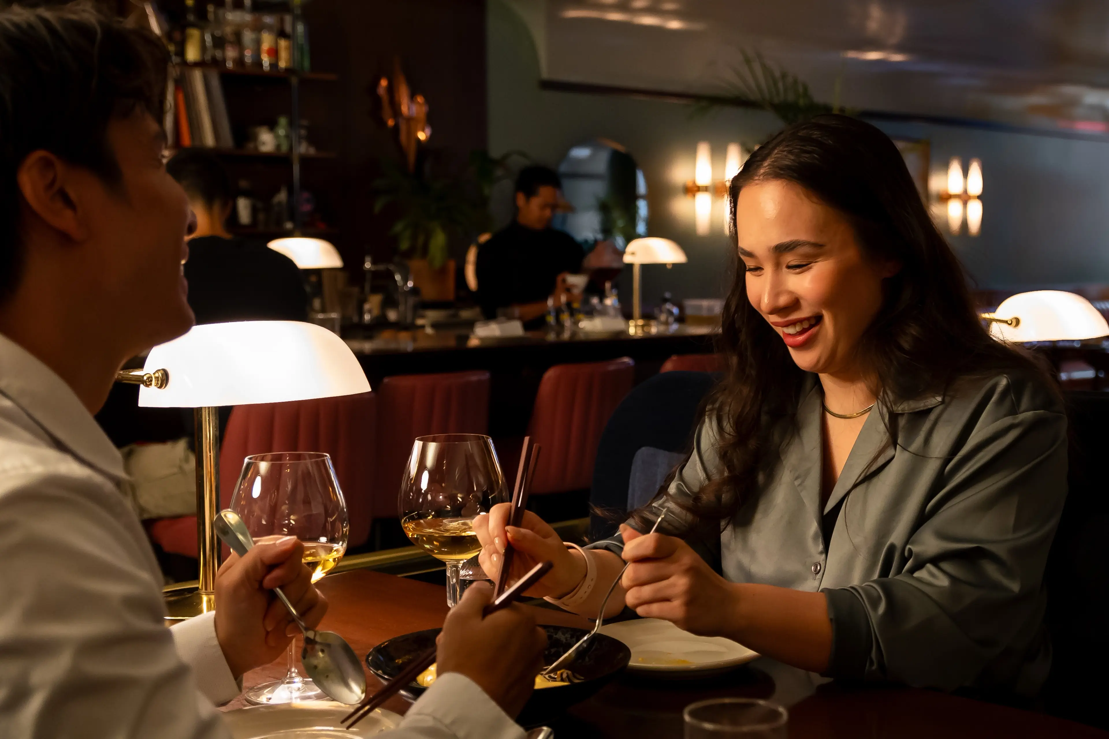 Two people dining at the restaurant Kissa Tanto in Vancouver.