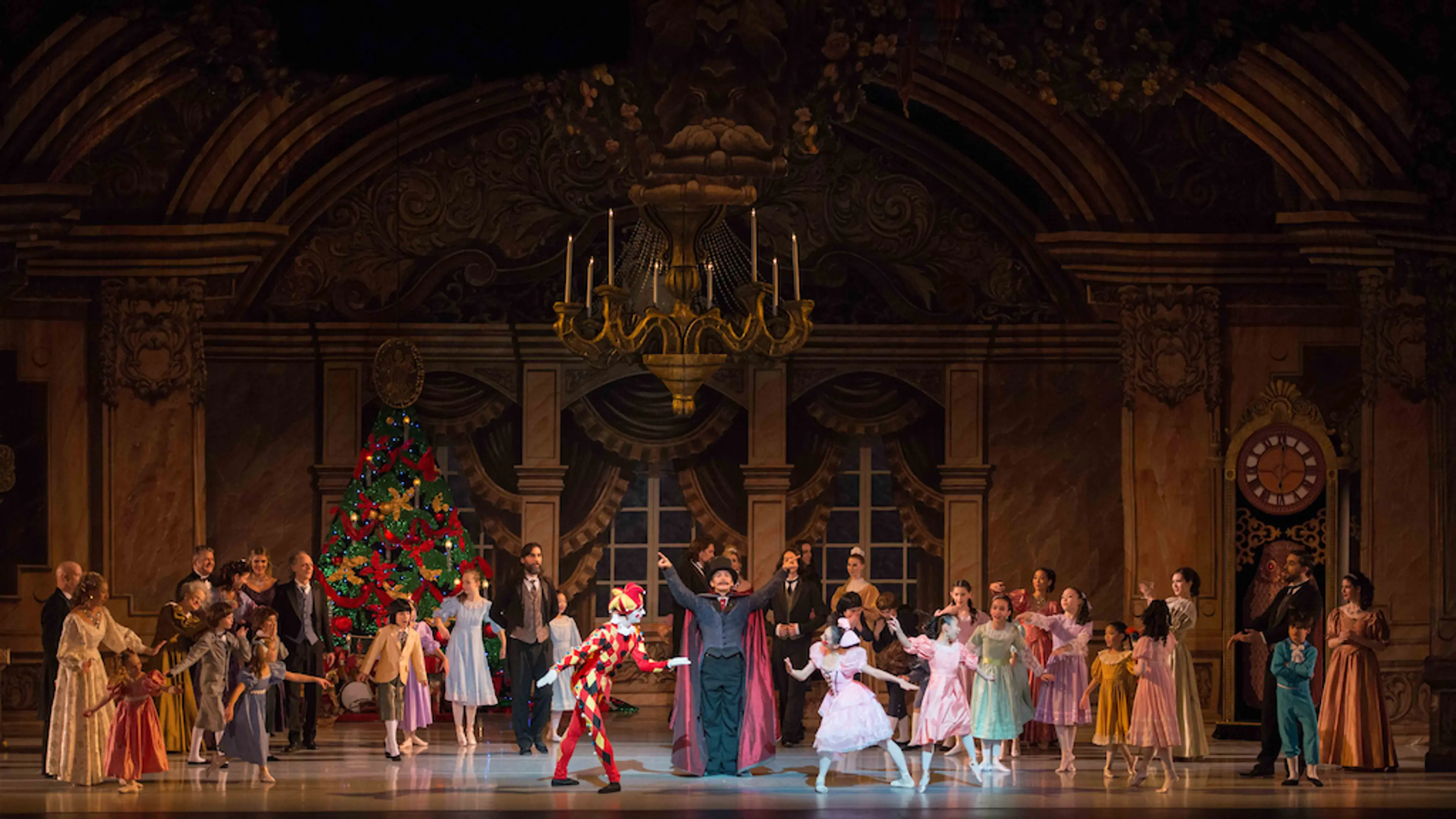 Costumed dancers on stage performing at Goh Ballet's The Nutcracker