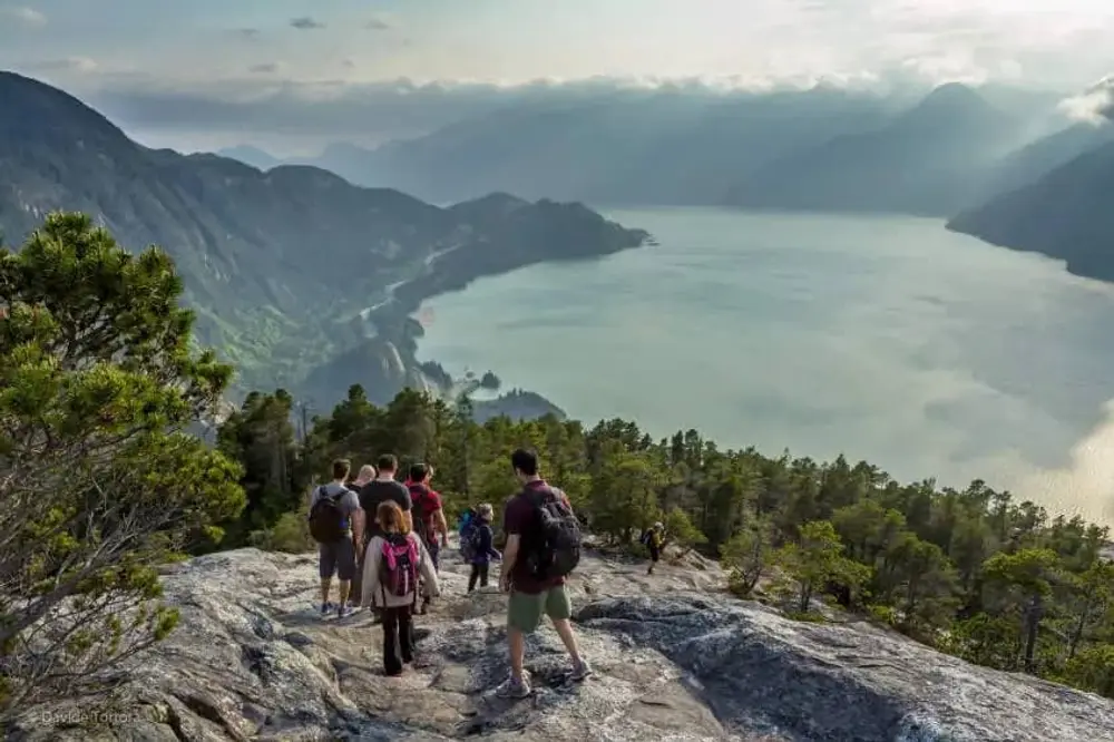 A group of people hiking down a mountain