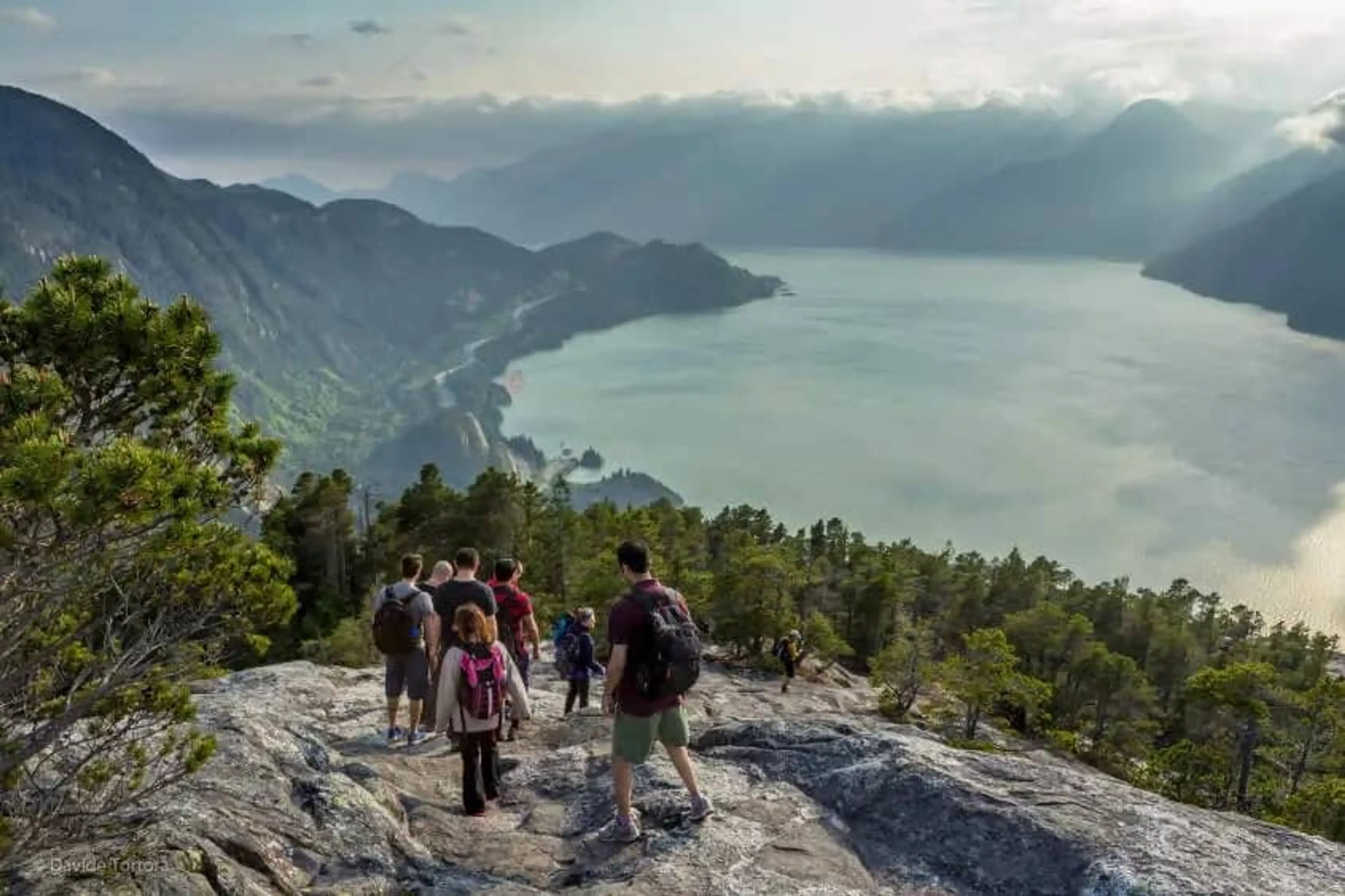 A group of people hiking down a mountain