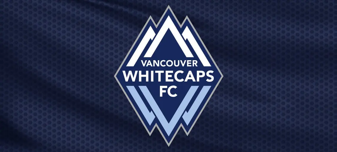 Vancouver Whitecaps FC logo with stylized mountain peaks on a dark blue textured background
