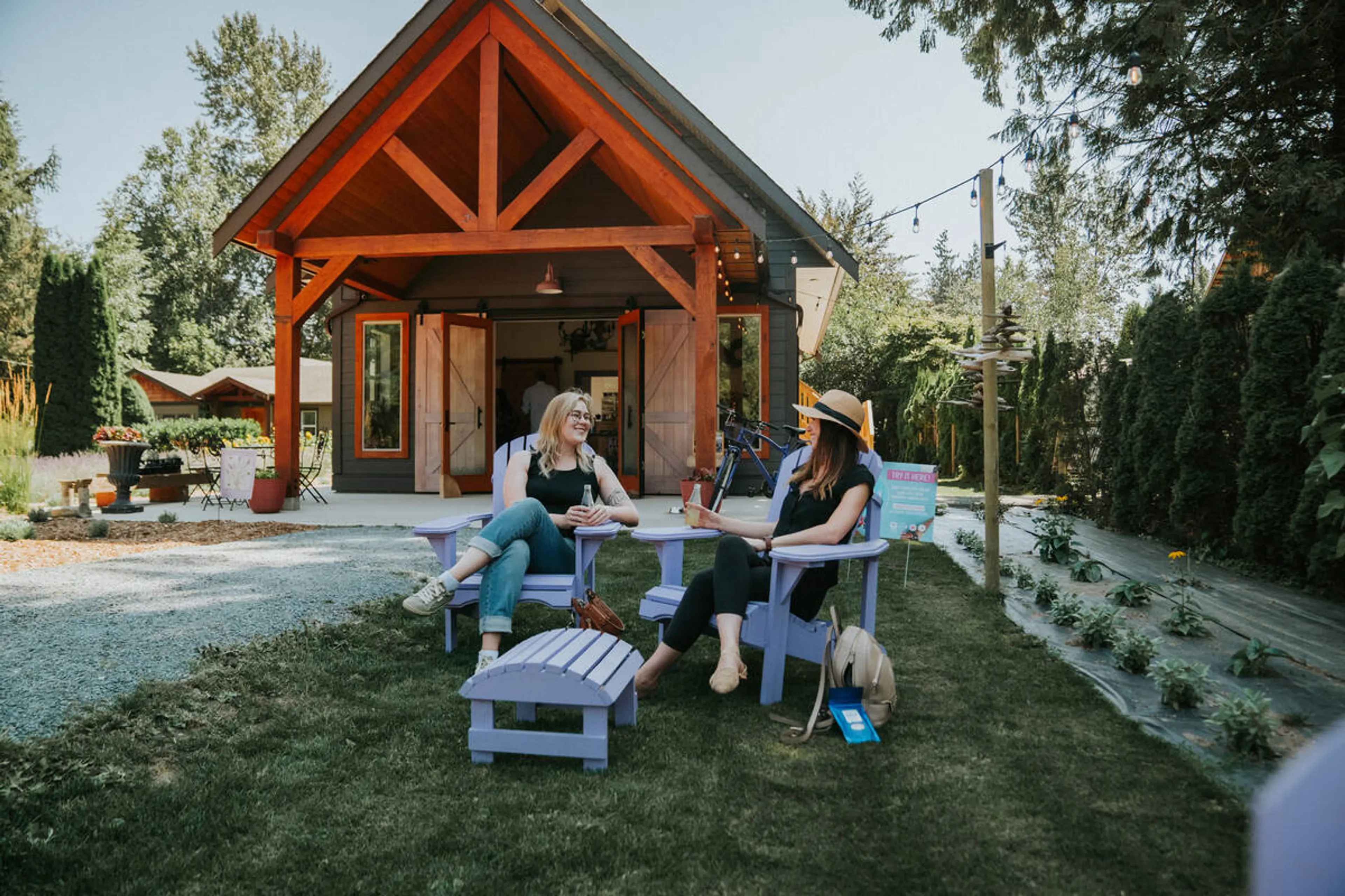 Two women enjoying drinks at the Harrison Lavender Farm near Vancouver