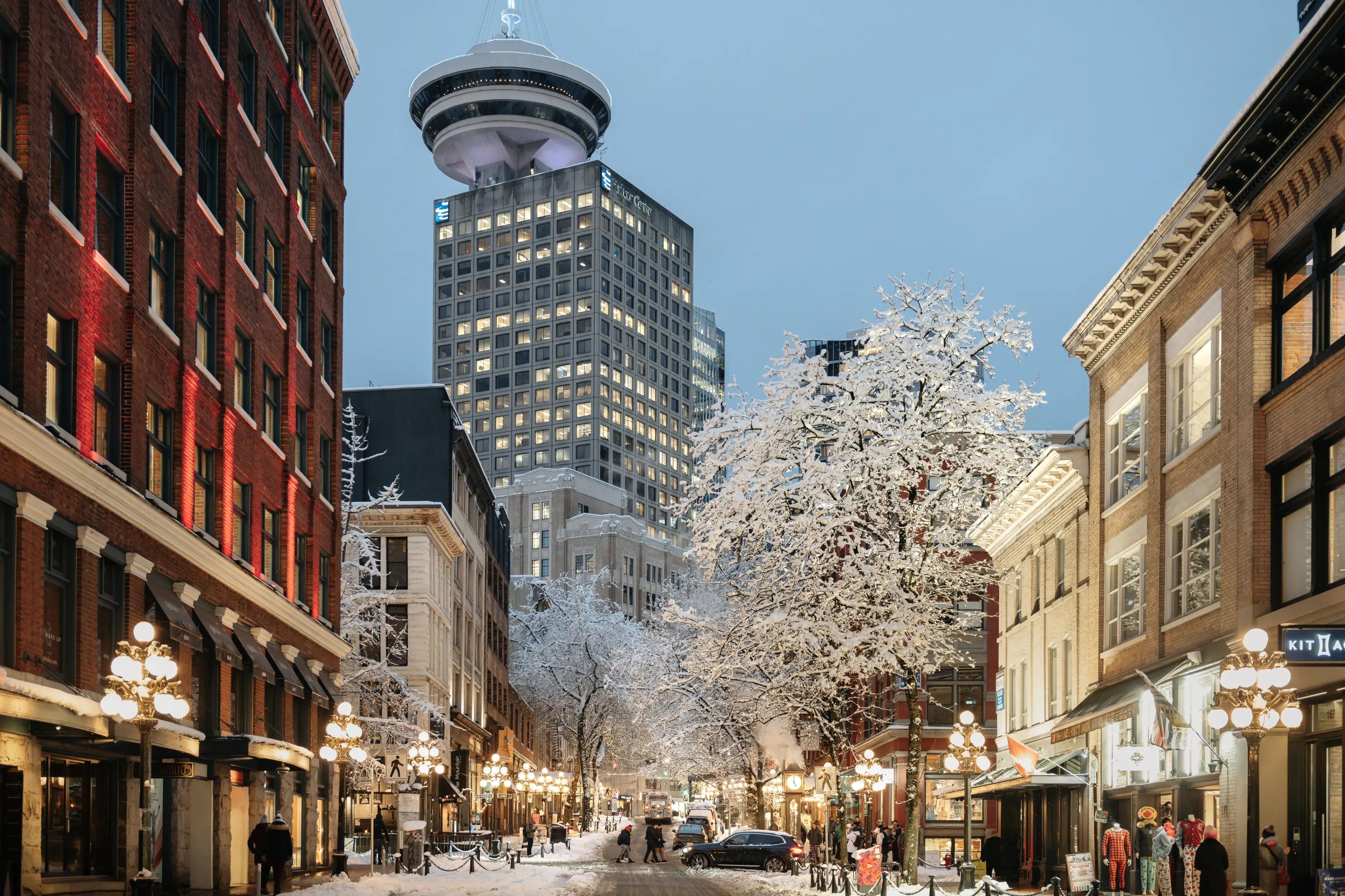 City image of Vancouver in the snow with the Vancouver Lookout tower in the center. 