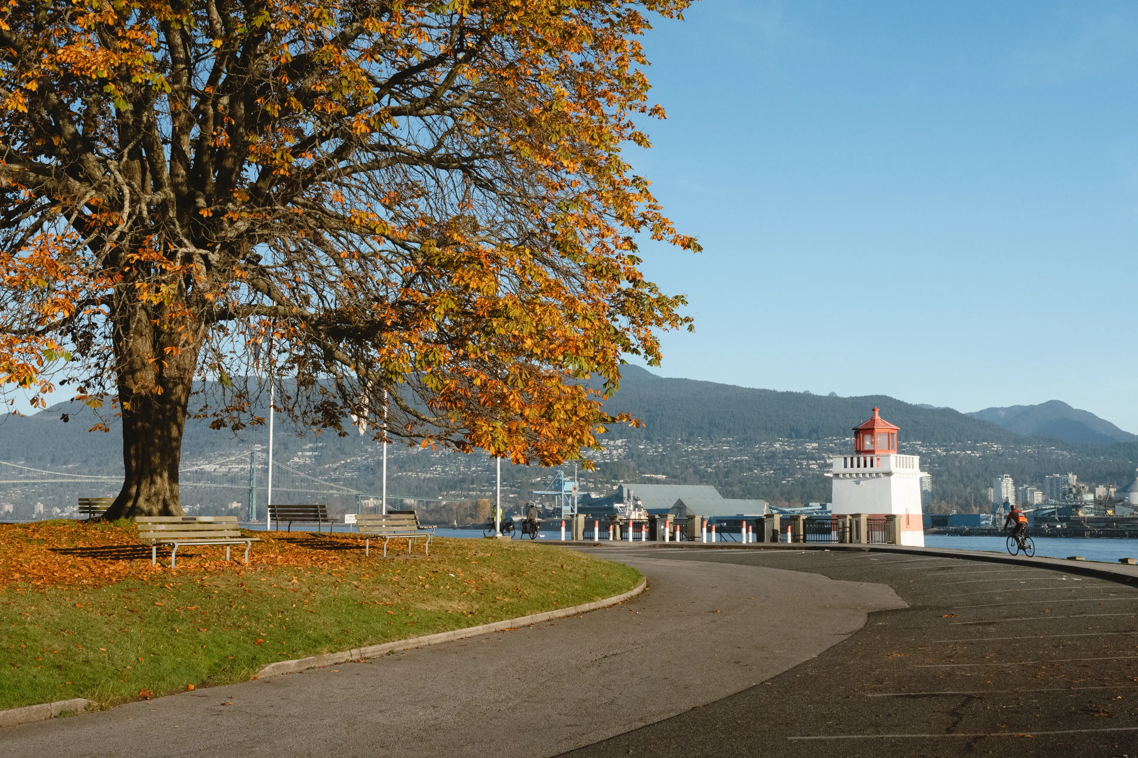 Biking past Brockton Point Lighthouse.