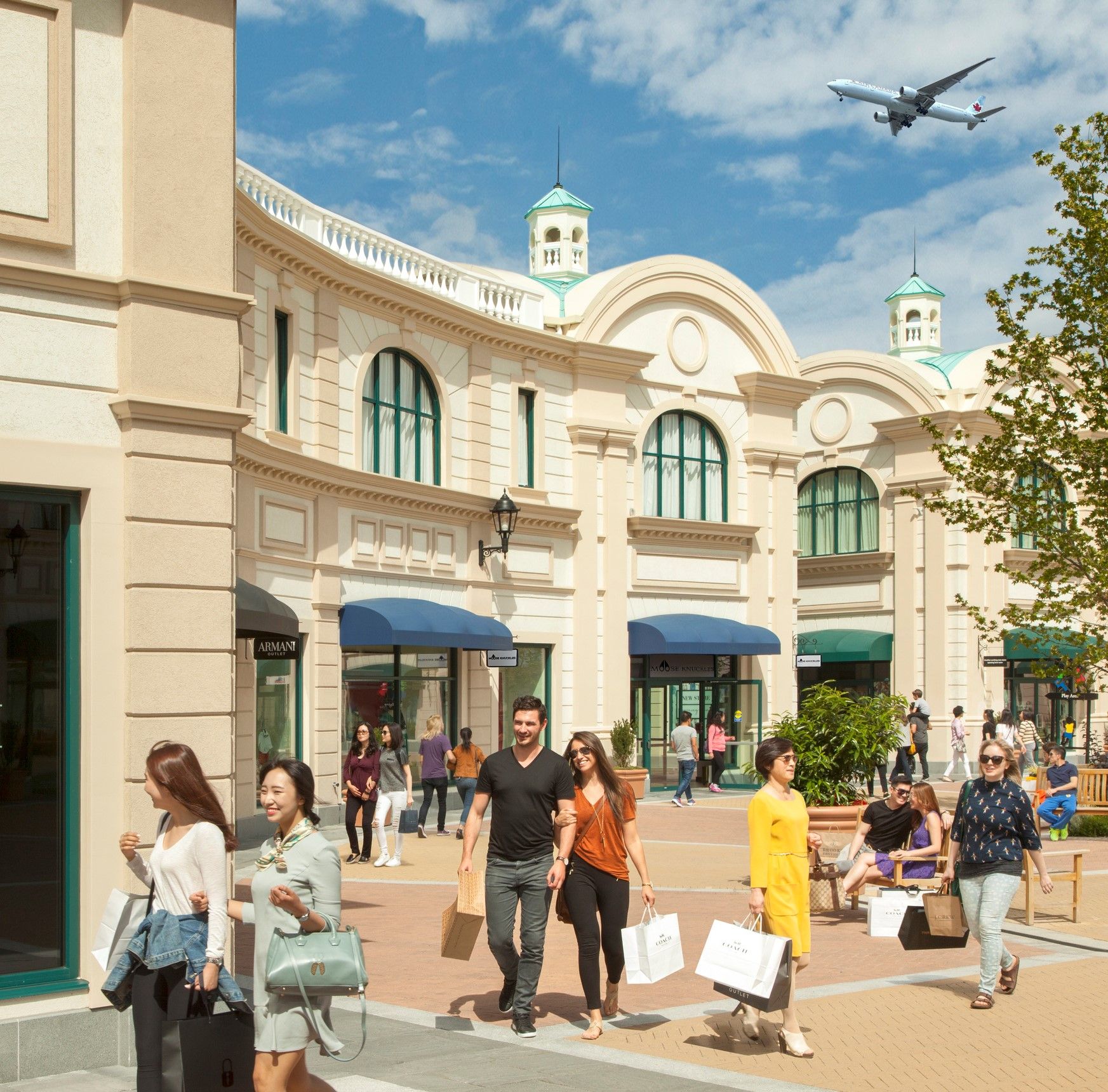 Plane and shoppers at Armani