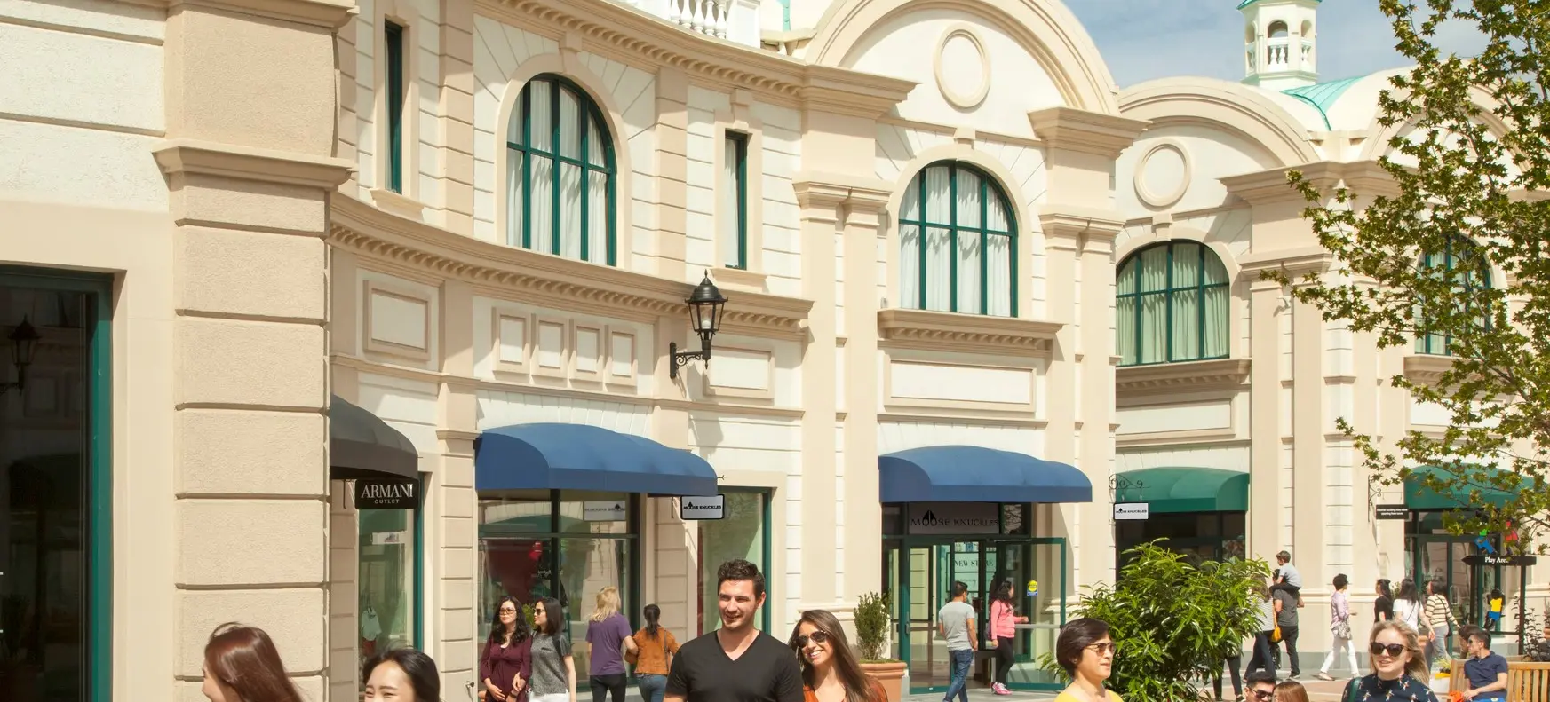 Plane and shoppers at Armani