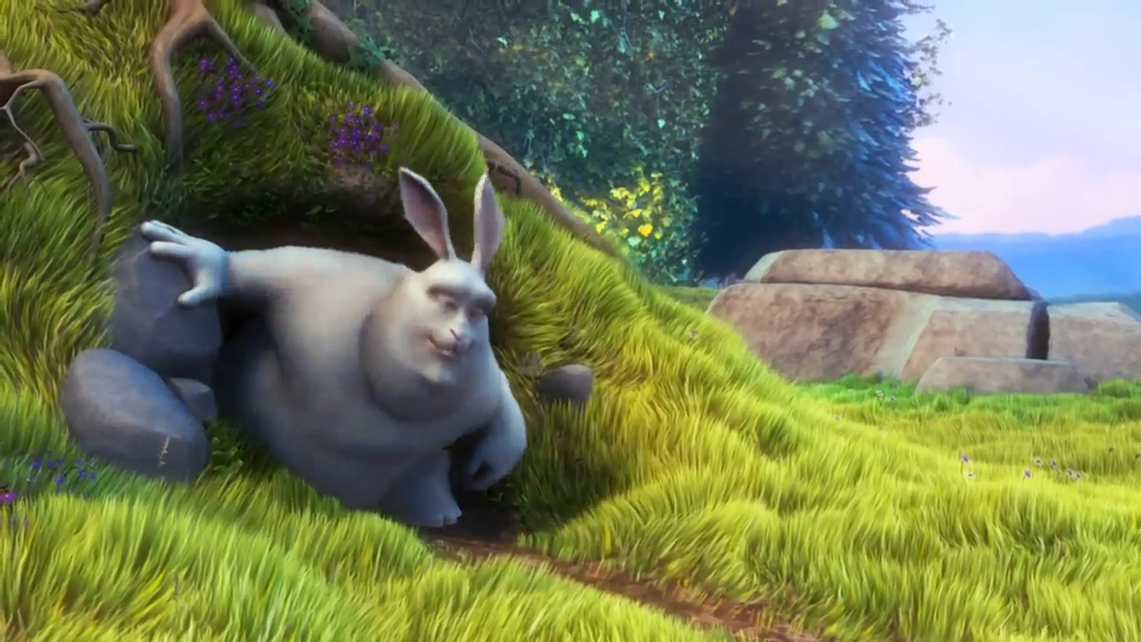 Large white animated rabbit emerging from a hole in a grassy hill with rocks and trees in the background.