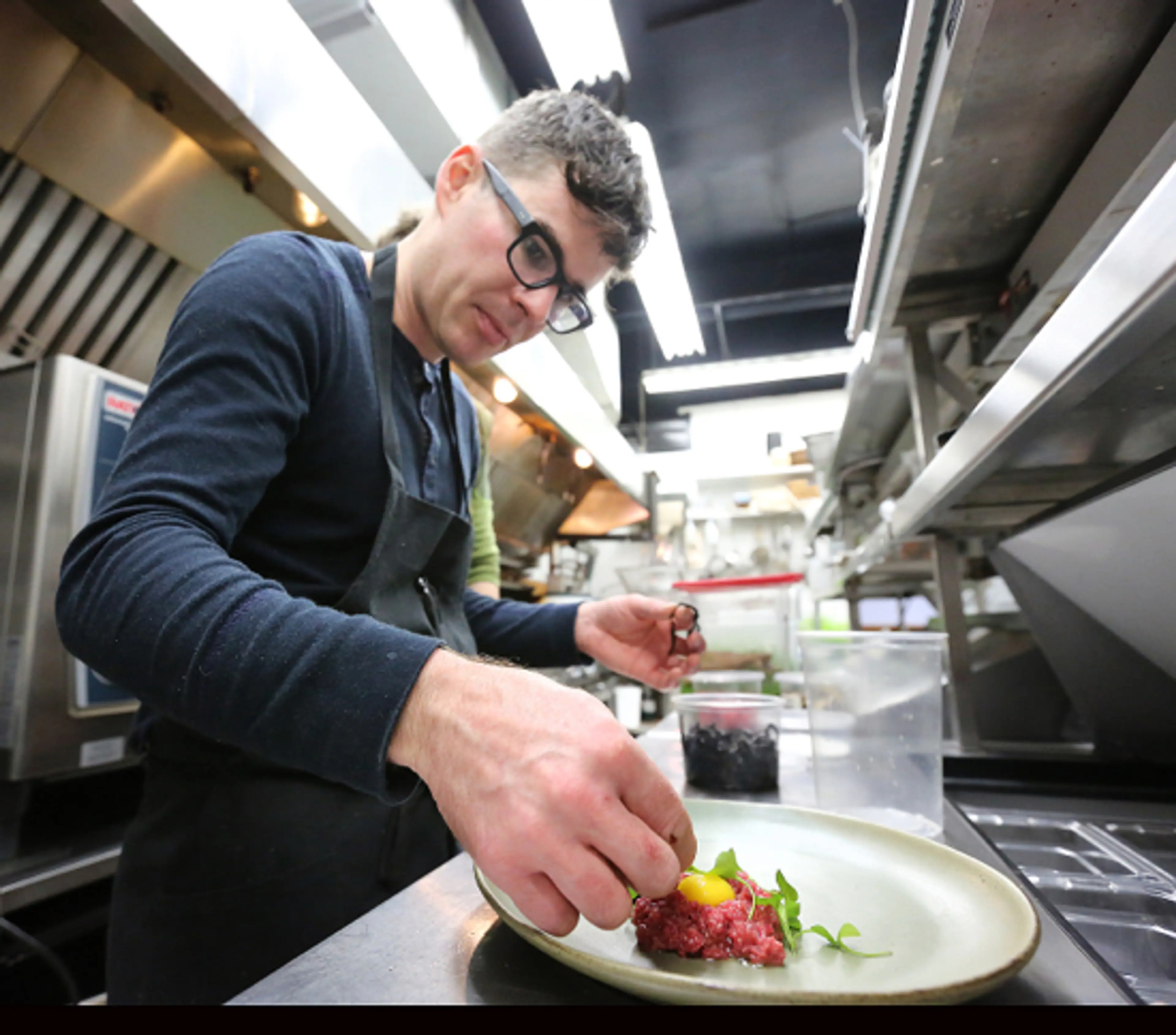 Kris Barnholden working his culinary magic (Sourced from Latab website)