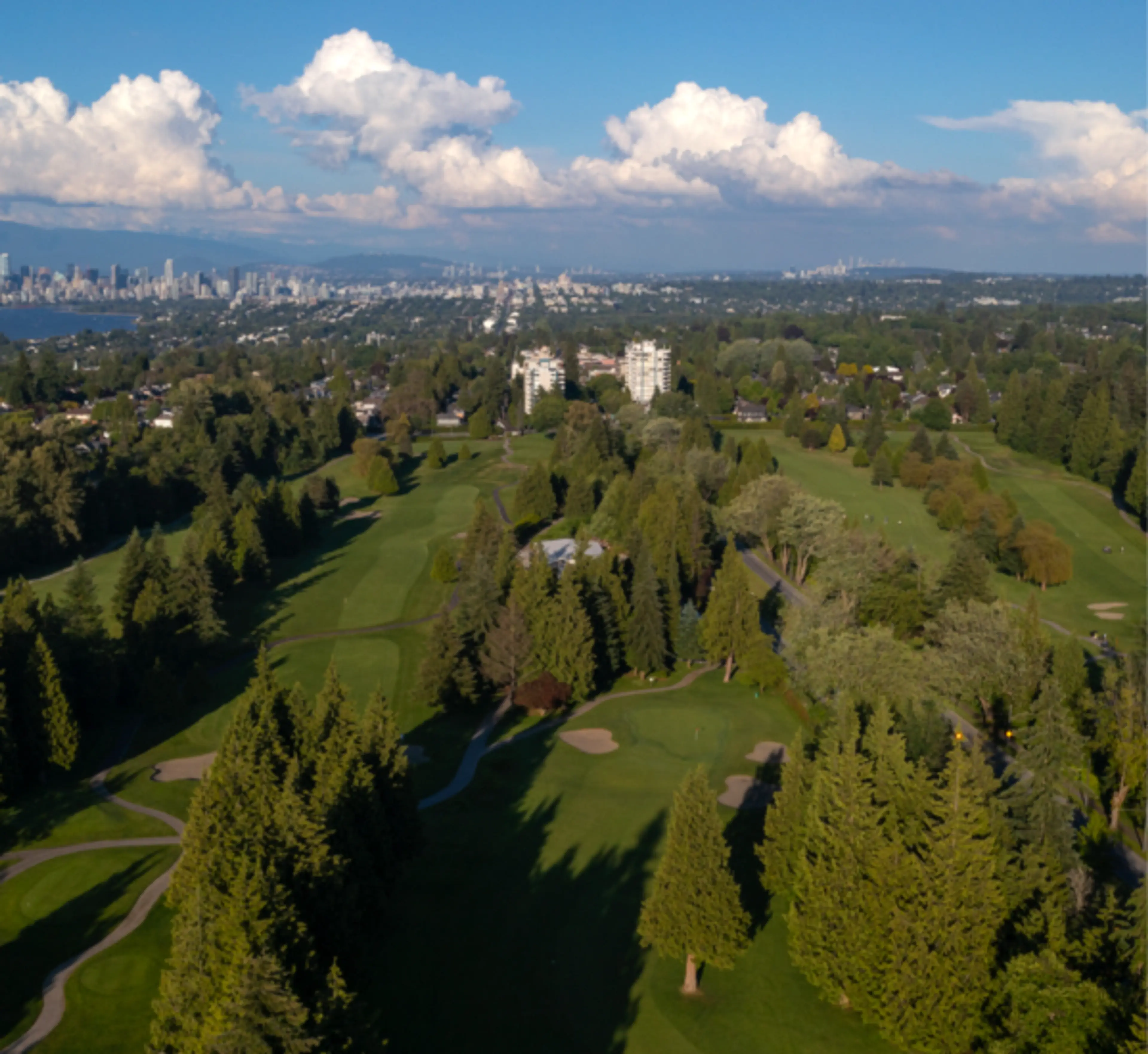 Aerial view of the University Golf Club with the city of Vancouver in the background. 