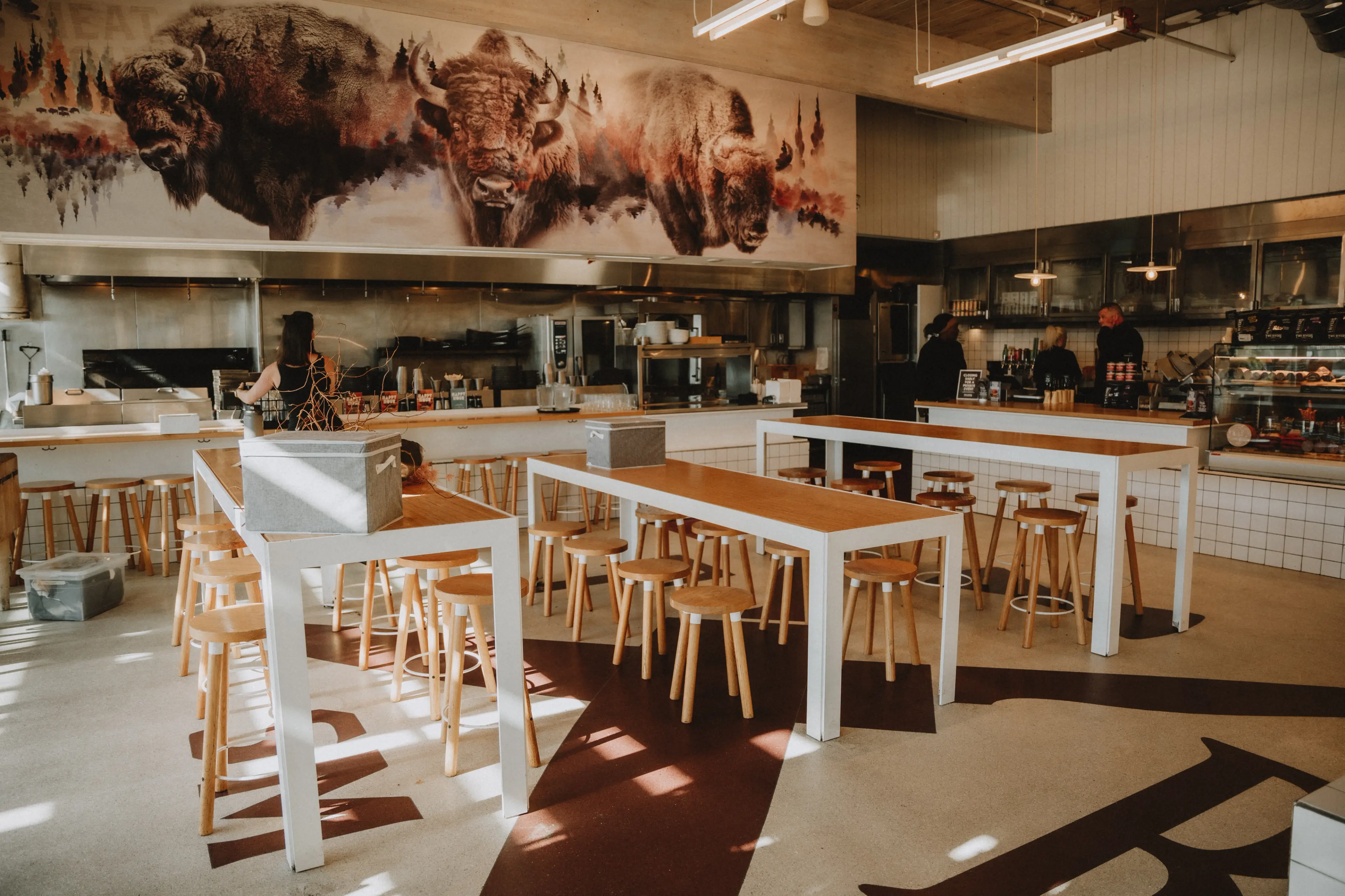 Interior photo of the restaurant and butcher shop Two Rivers Meats in North Vancouver.