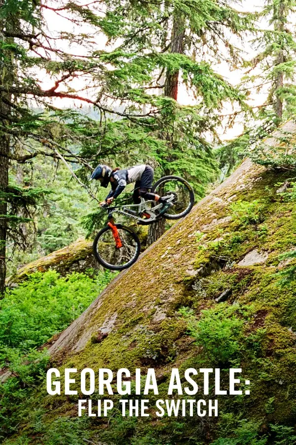 Mountain biker Georgia Astle descends a slab on her in bike. Still from the film Georgia Astle: Flip the Switch