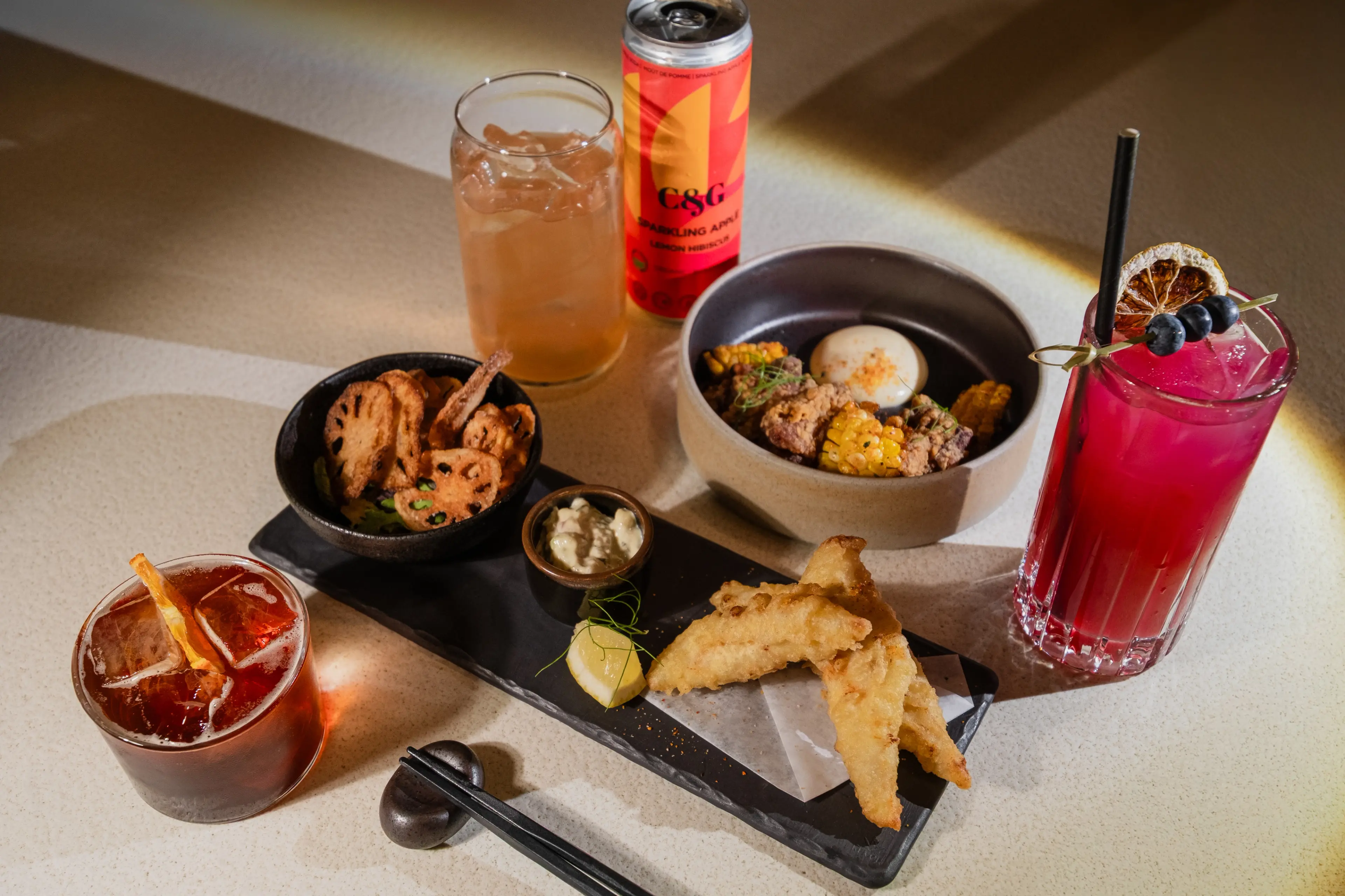Plates and drinks at Minami Sushi Restaurant, Vancouver.