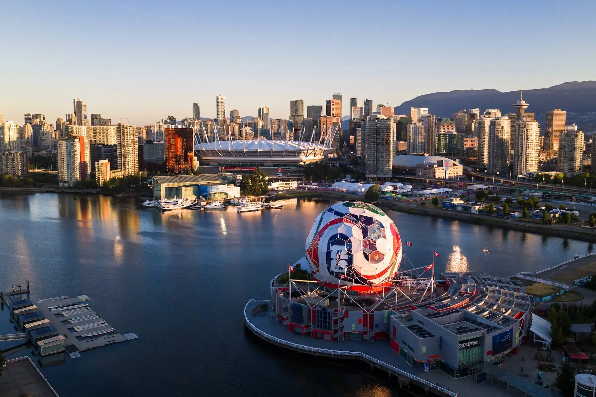 Aerial view of a city skyline of BC Place and Science World in Vancouver.