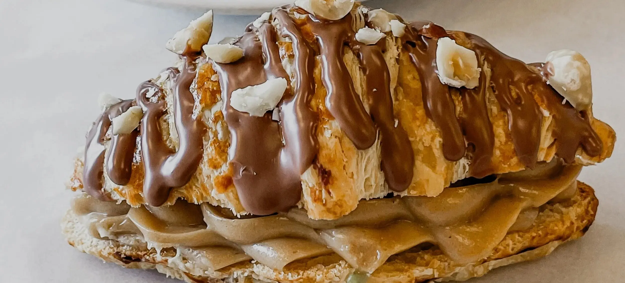 w-2499h-1406-485cbb-Chocolate-Hazelnut+Croissant1