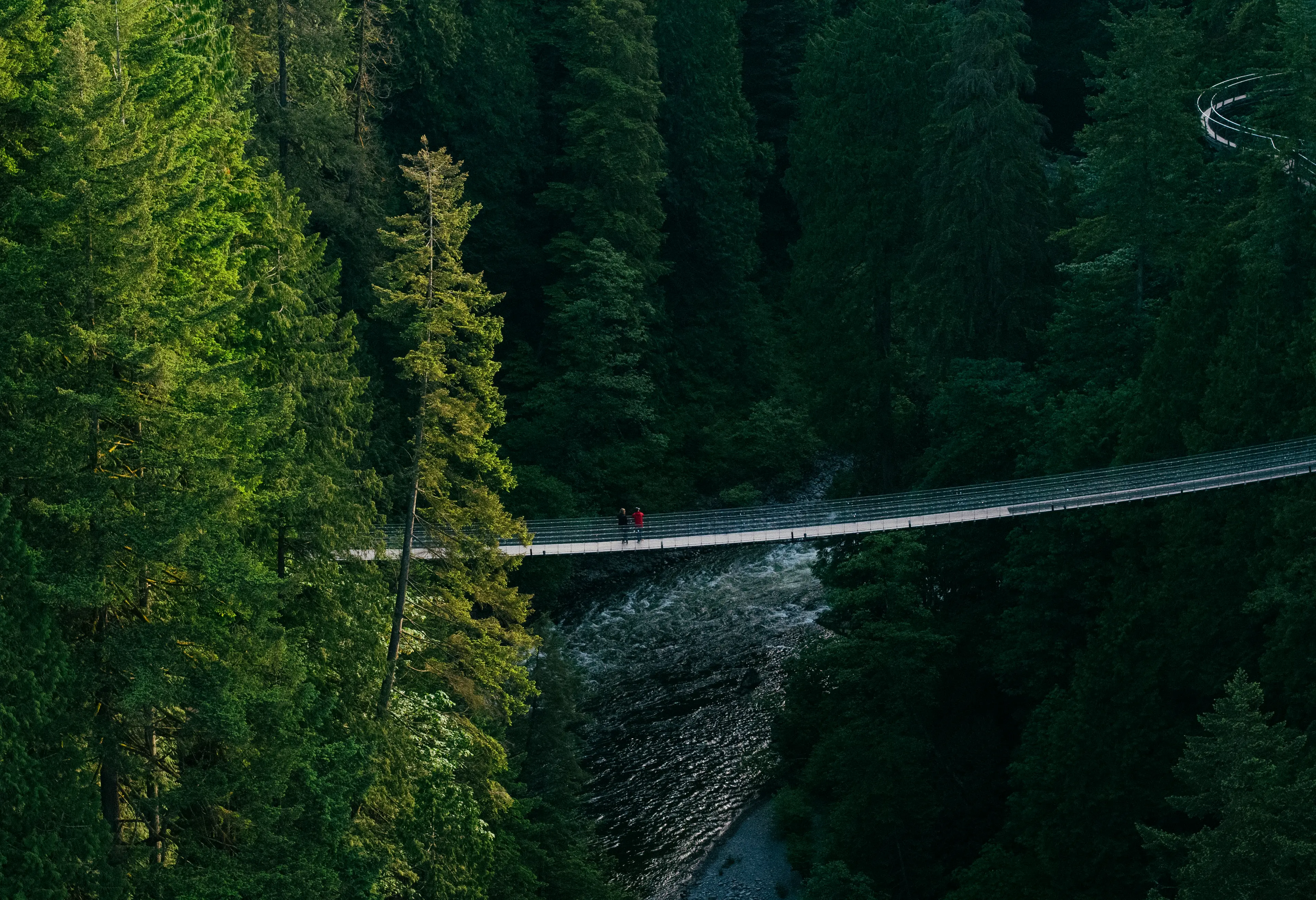 Capilano Suspension Bridge with Cliffwalk above Capilano River at Capilano Suspension Bridge Park