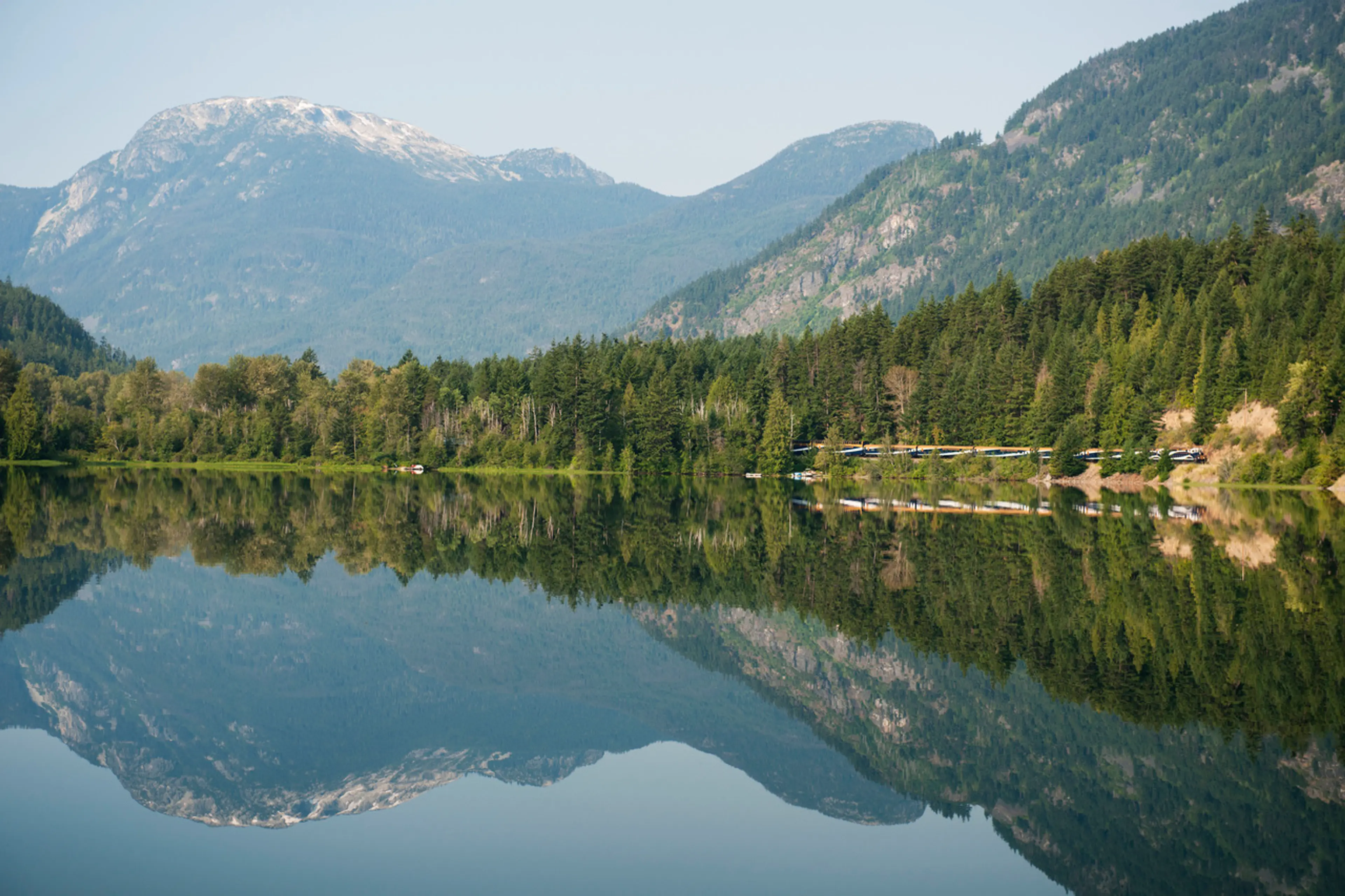 Rocky Mountaineer train travelling beside Gates Lake, B.C.