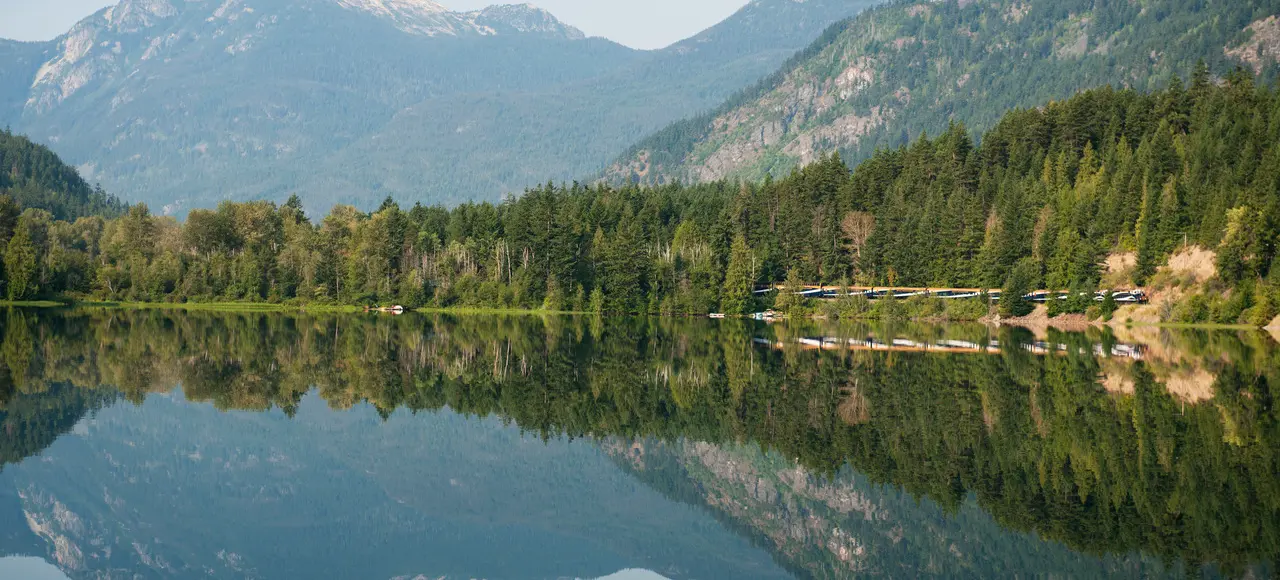 Rocky Mountaineer train travelling beside Gates Lake, B.C.