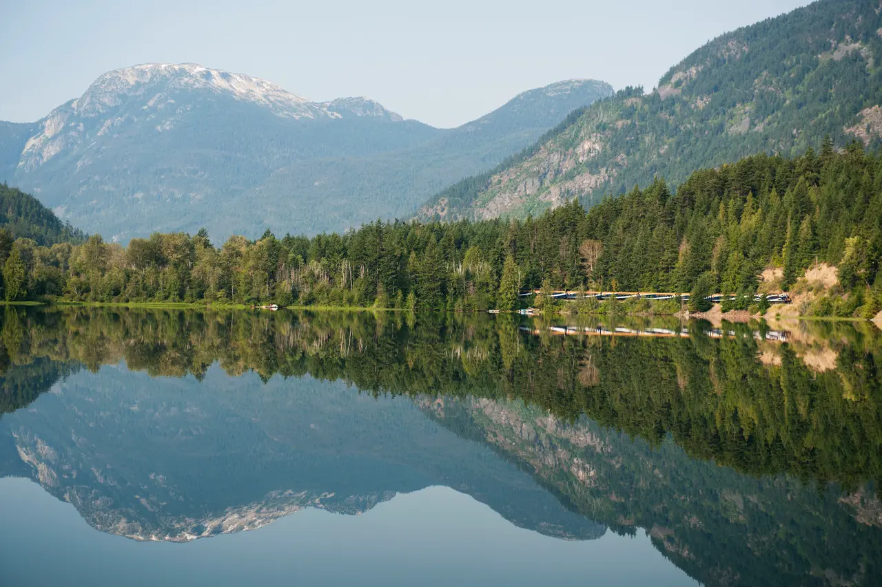 Rocky Mountaineer train travelling beside Gates Lake, B.C.
