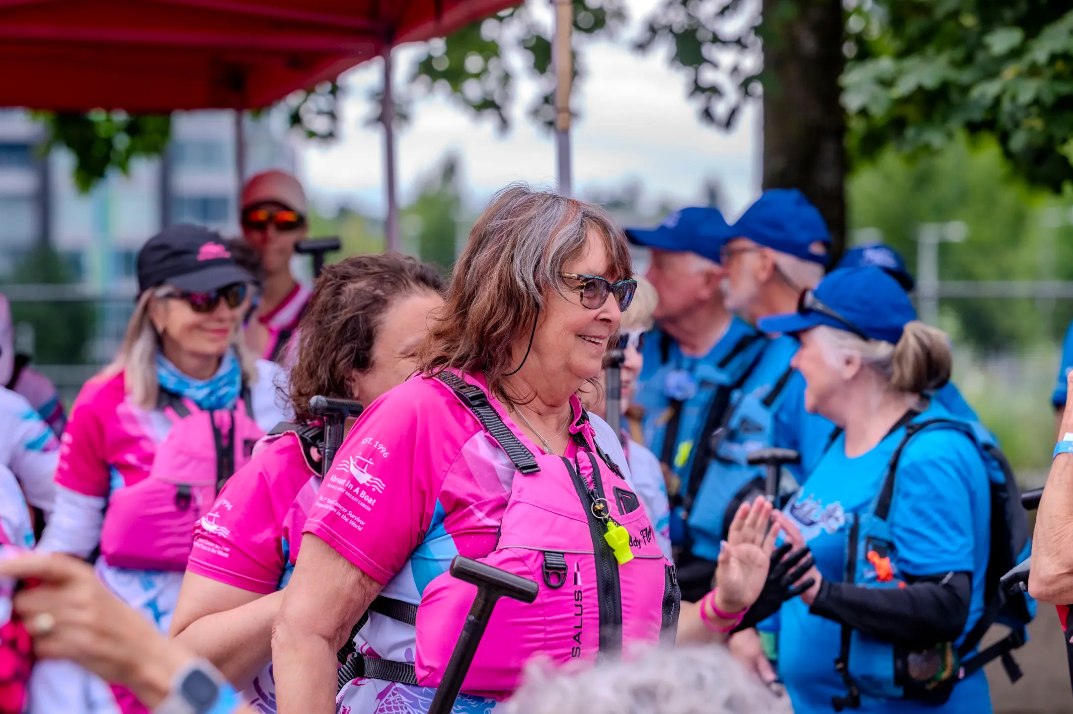 Abreast in a Boat Paddlers with other paddlers