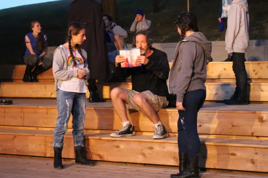 Instructor Mike Stacks works with the company for last year's Henry V.