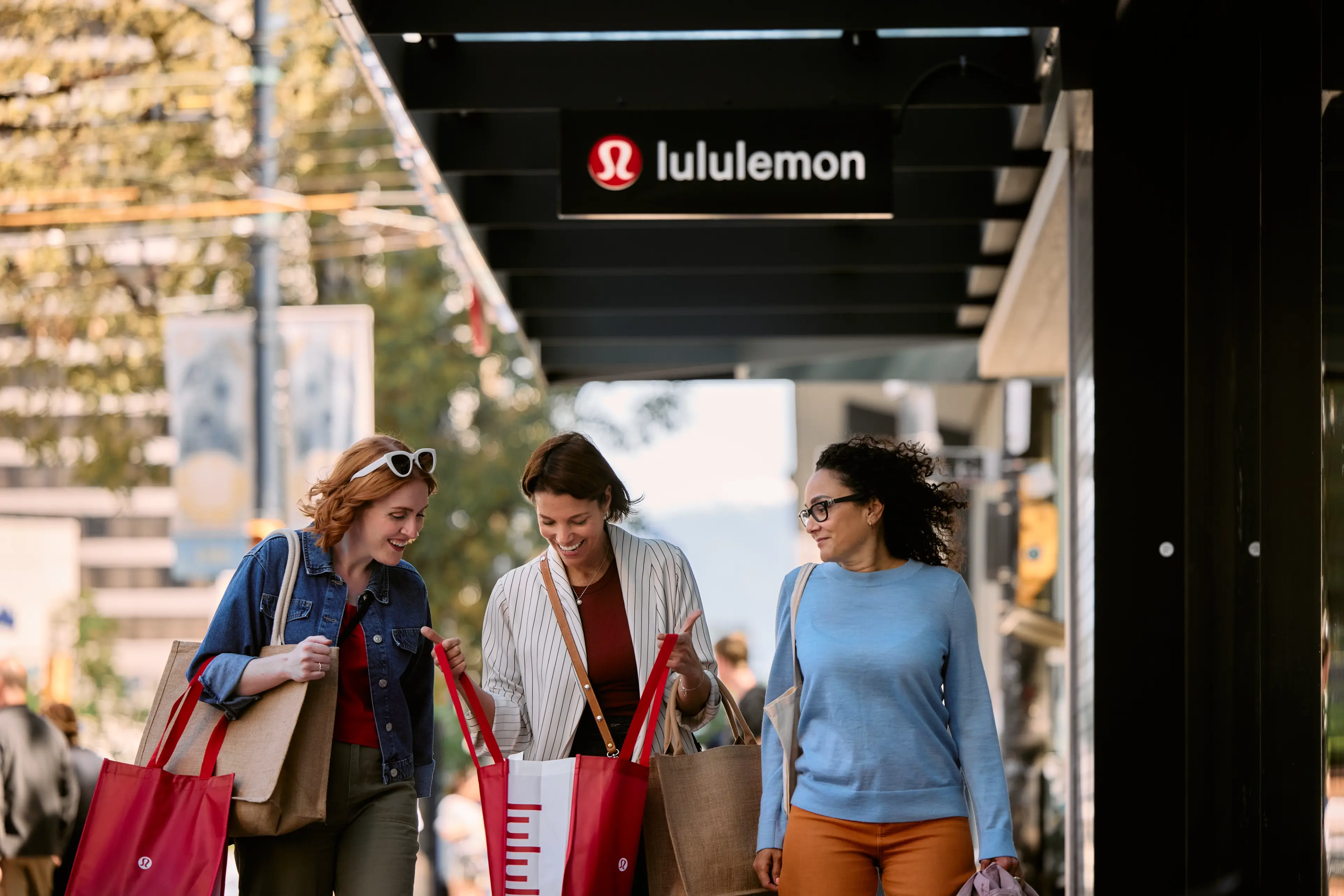 Shoppers in downtown Vancouver looking at purchases