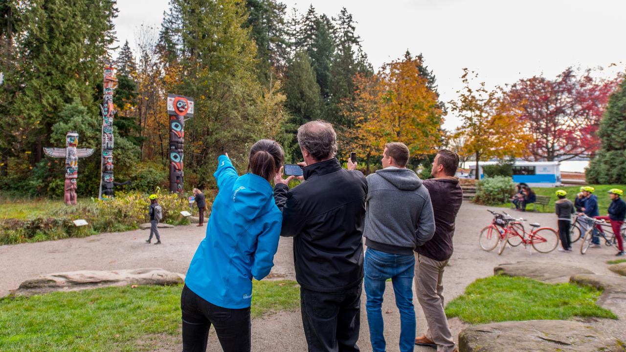 Landsea at the Stanley Park totem poles with guests