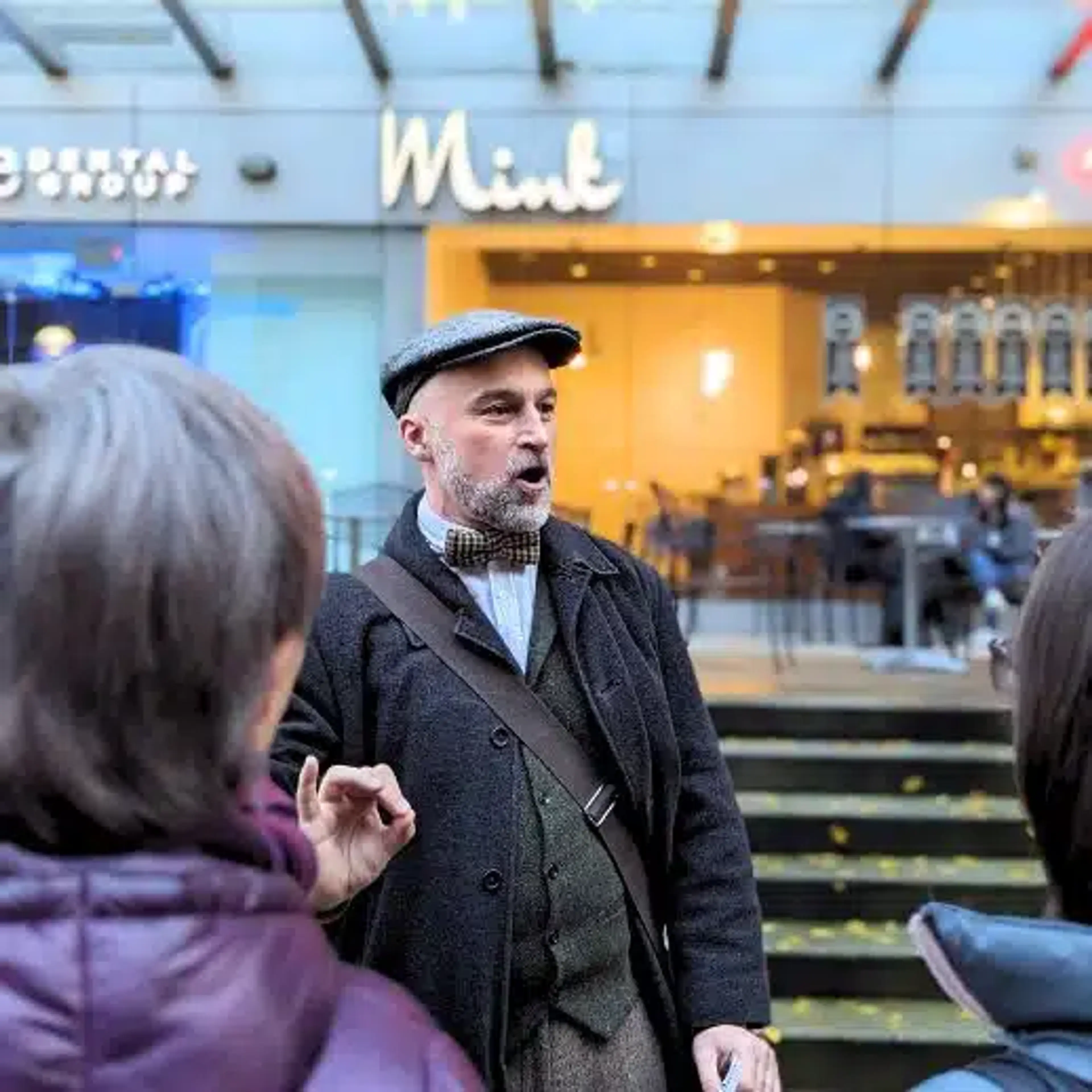 A guide leads a Forbidden Vancouver tour