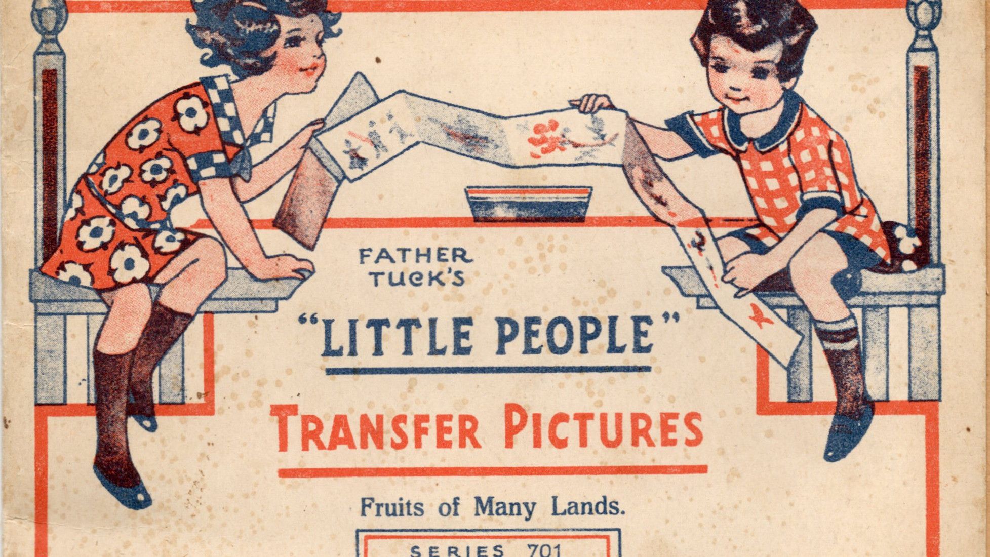 Two children sitting on benches holding a long strip of transfer pictures with text about Father Tuck's Little People Transfer Pictures, Fruits of Many Lands, Series 701.